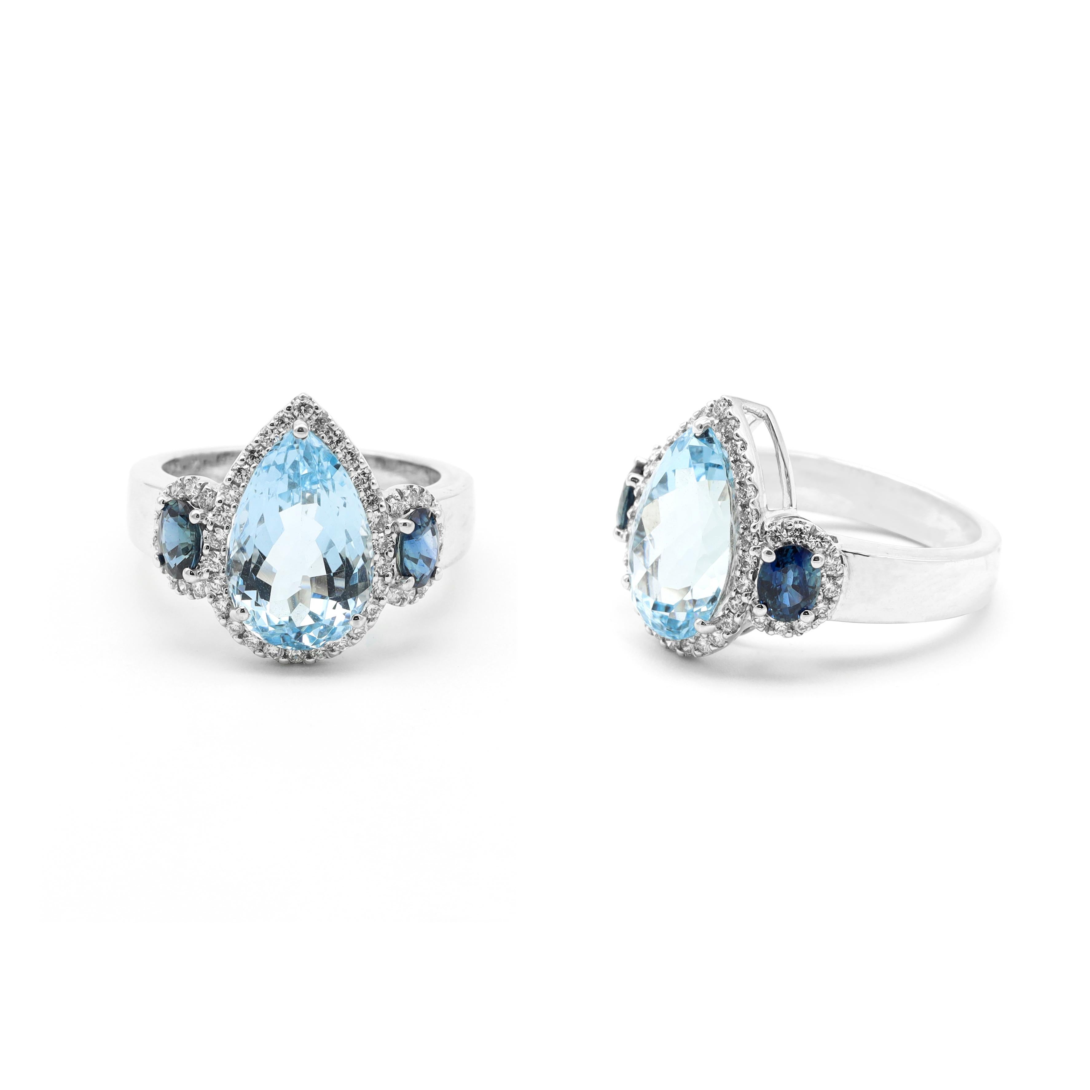 18 Karat White Gold 4.44 Carat Aquamarine, Sapphire, and Diamond Three Stone Ring

This exquisite trinity aqua sky aquamarine and azure blue sapphire diamond cluster ring is magnificent. The three-stone trinity ring tells a story by not only