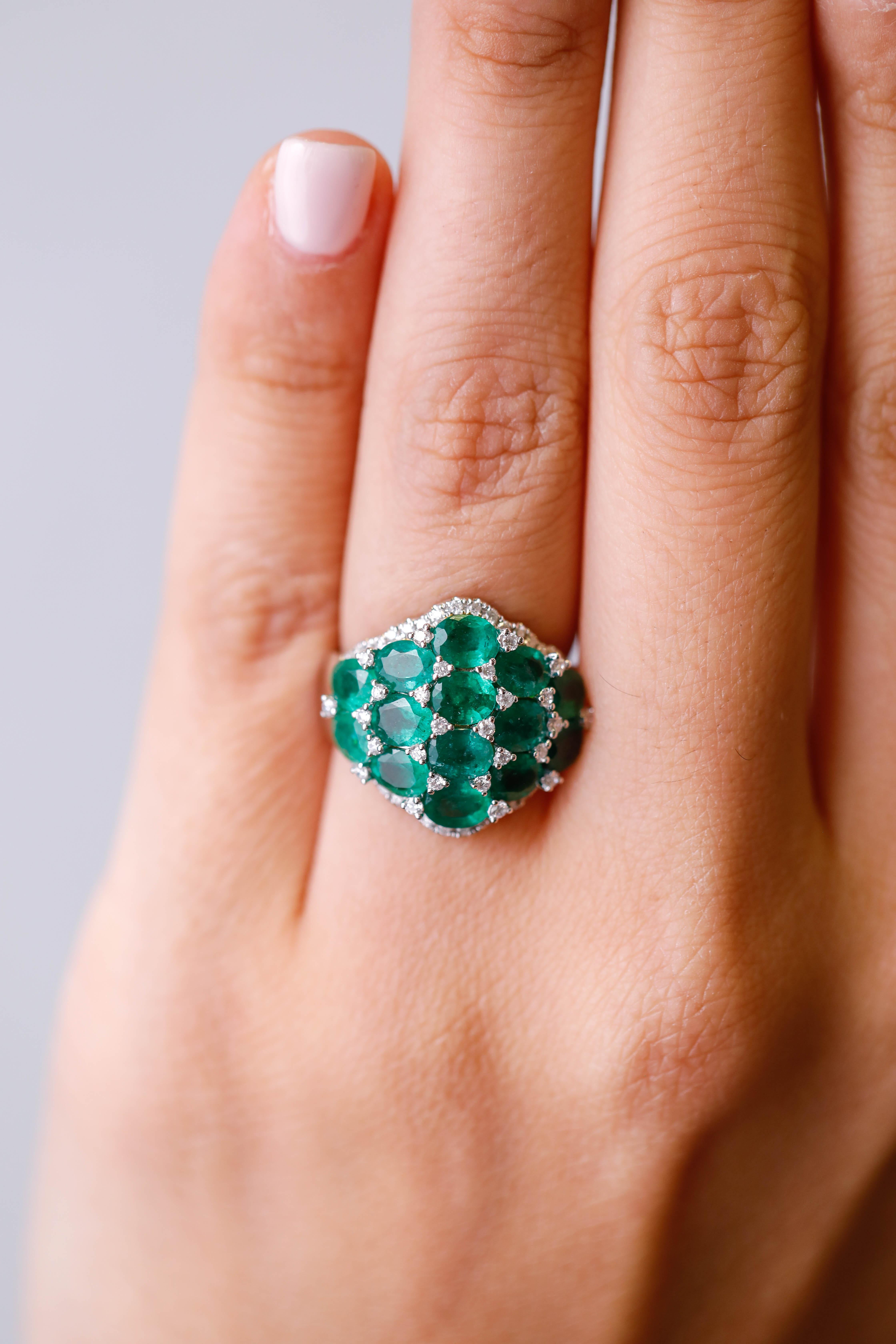 4.58 ct Oval Shaped Emerald and Diamond Accent Cluster Ring in 18 kt White Gold In New Condition For Sale In New York, NY