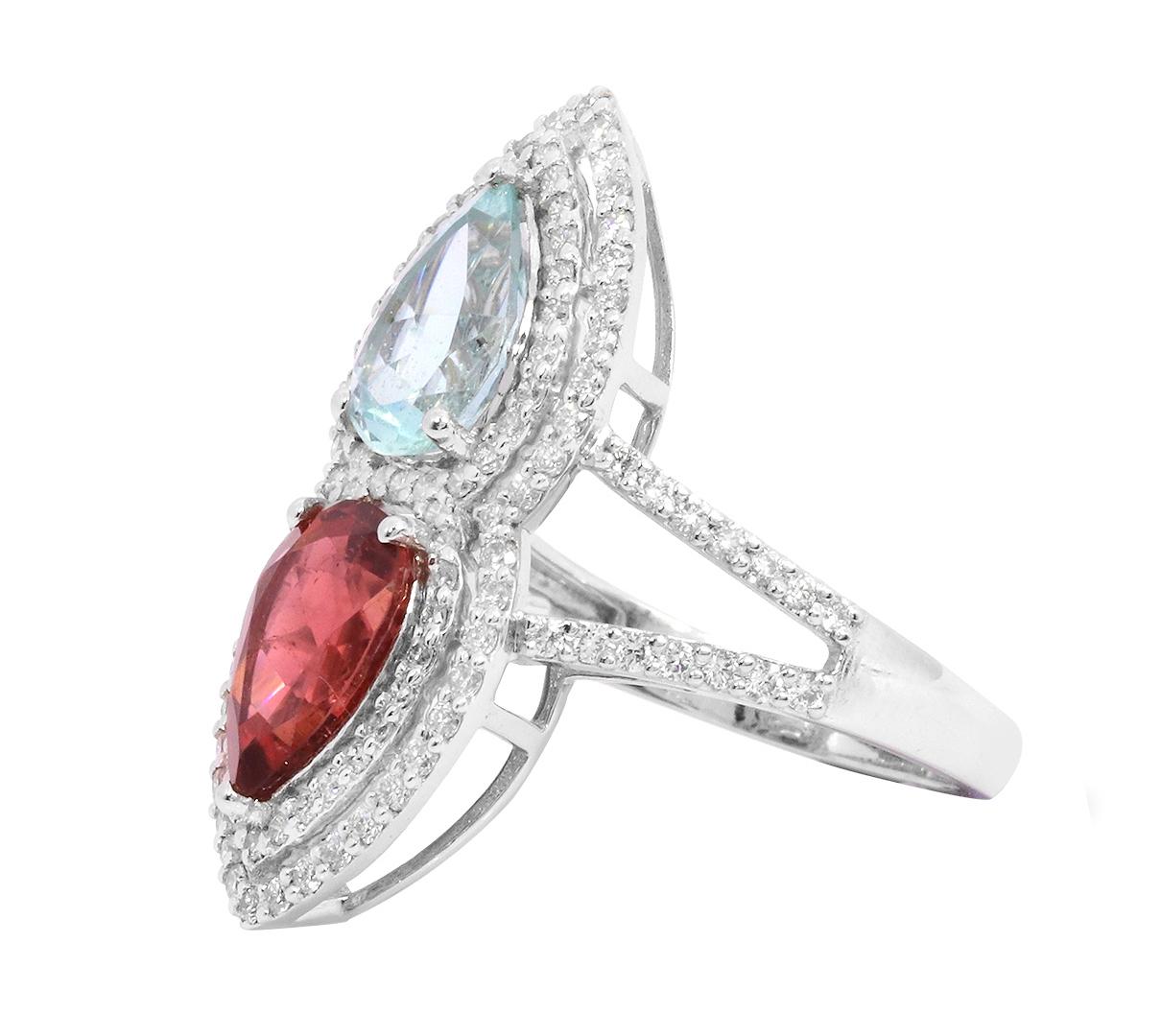 18 Karat White Gold 4.59 Carat Aquamarine, Tourmaline, and Diamond Fashion Ring

Have stardust at your fingertips with this captivating ring by Gems Paradise. Featuring Pear-Shape Aquamarine and a Pear-Shaped Tourmaline set in a 3 prong setting and
