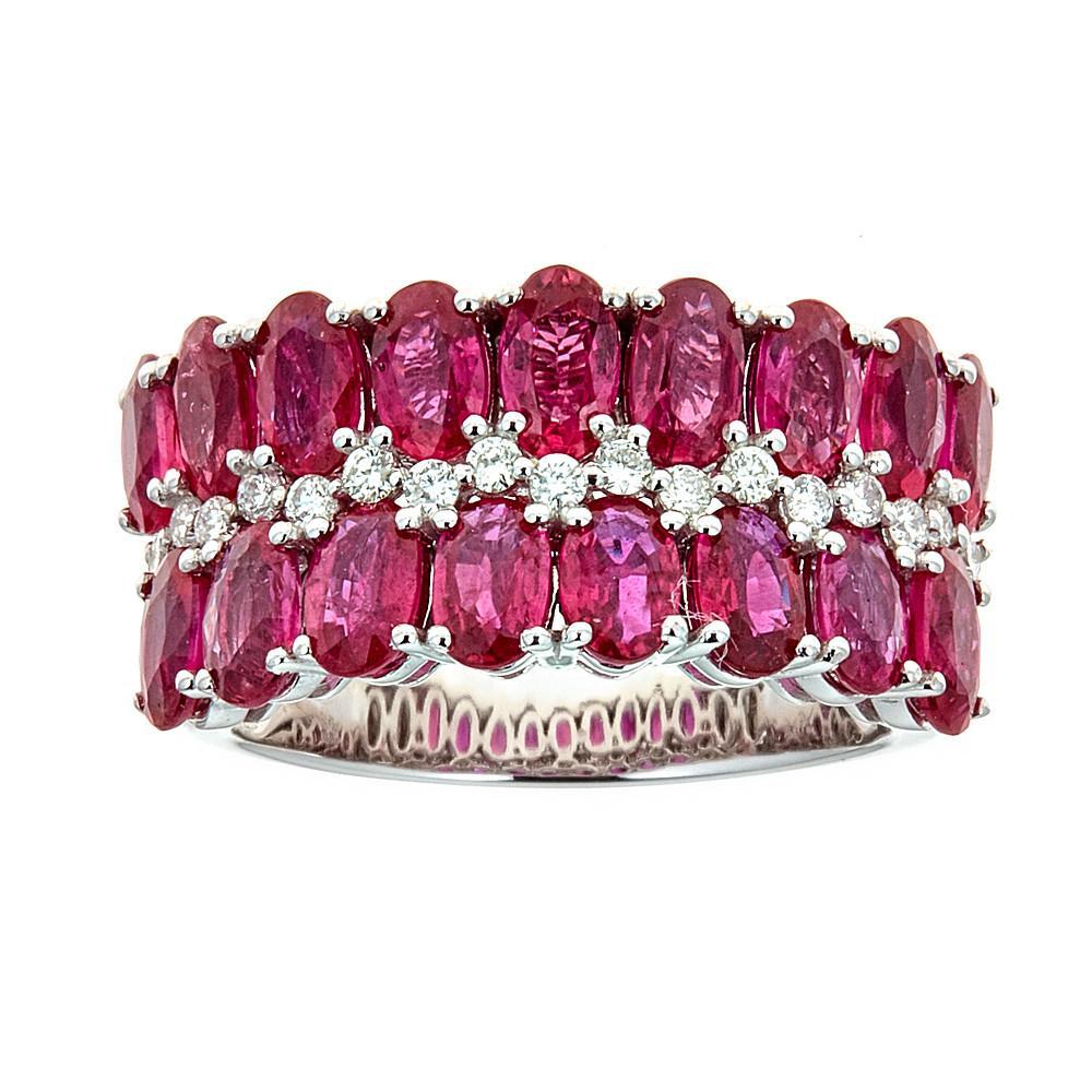 4.75 Carat Oval Cut Ruby and 0.22 Carat Diamond Pave 18K White Gold Cluster Ring

A wedding band or an Anniversary ring - this ring is just perfection. Featuring a Double row of 4.75 Carat natural Oval Cut Ruby stones , set in a Prong setting.
