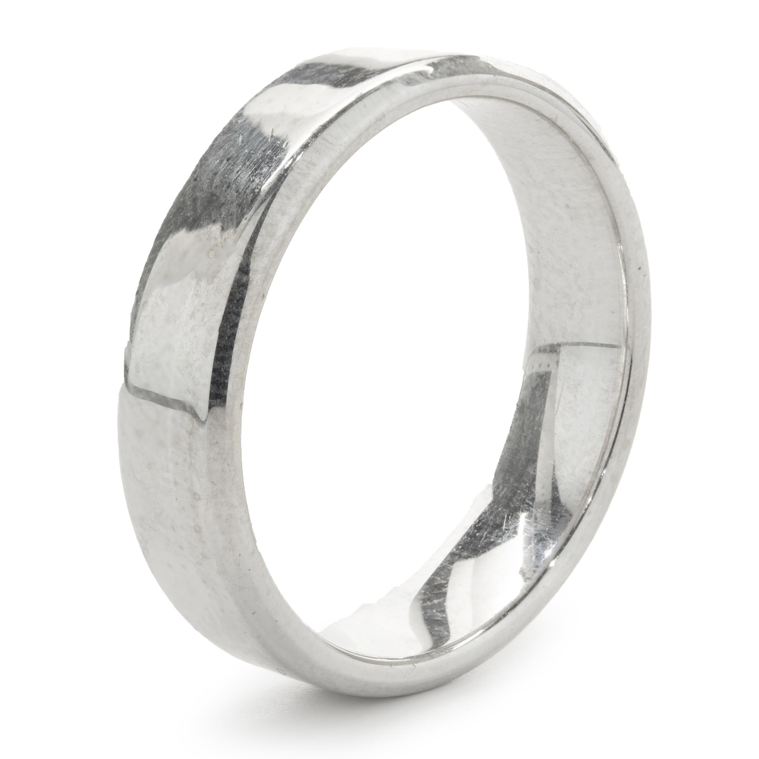 Designer: custom
Material: 18K white gold
Dimensions: the ring measures 4mm wide
Weight:  8.74 grams
Ring Size: 9 (Please allow up to 2 additional business days for sizing requests) 
