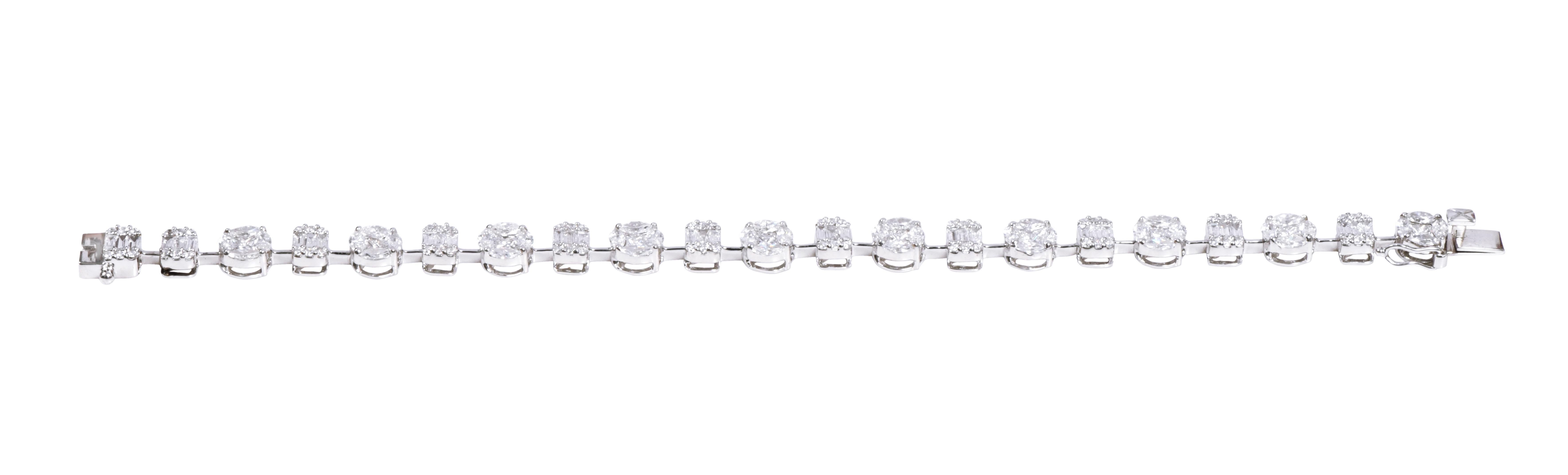 18 Karat White Gold 5.20 Carat Diamond Tennis Bracelet

We present to you a striking and heavenly design with a classic edge. The best in class and luxurious diamonds that are crafted to form a one-of-a-kind and timeless design. The amalgamation of