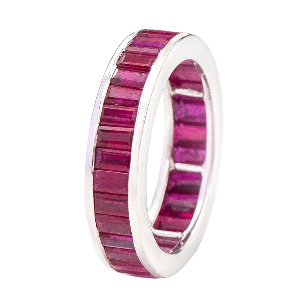 18 Karat White Gold 5.46 Carat Baguette-Cut Ruby Eternity Band Ring For Sale