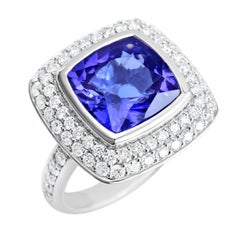 18 Karat White Gold 6.52 Carat Natural Tanzanite Ring with 68 VS/G Diamonds