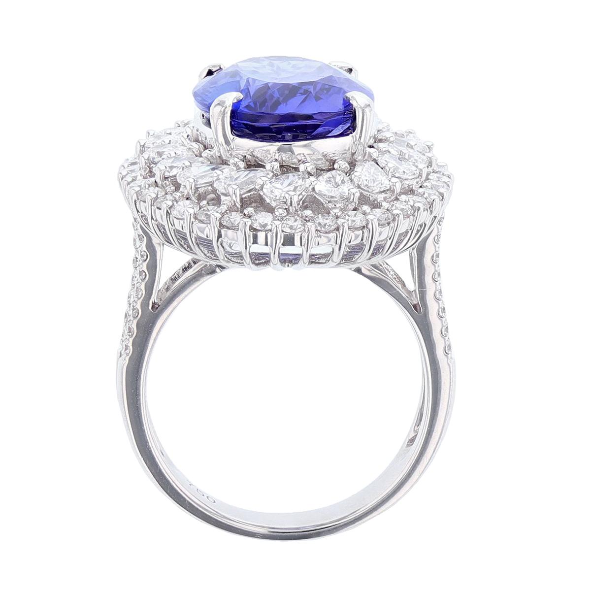 Contemporary 18 Karat White Gold 6.53 Carat Oval Tanzanite and Diamond Ring For Sale
