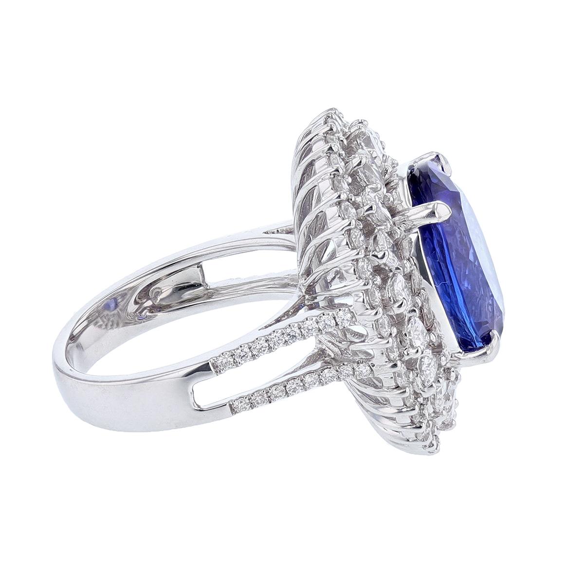 Oval Cut 18 Karat White Gold 6.53 Carat Oval Tanzanite and Diamond Ring For Sale