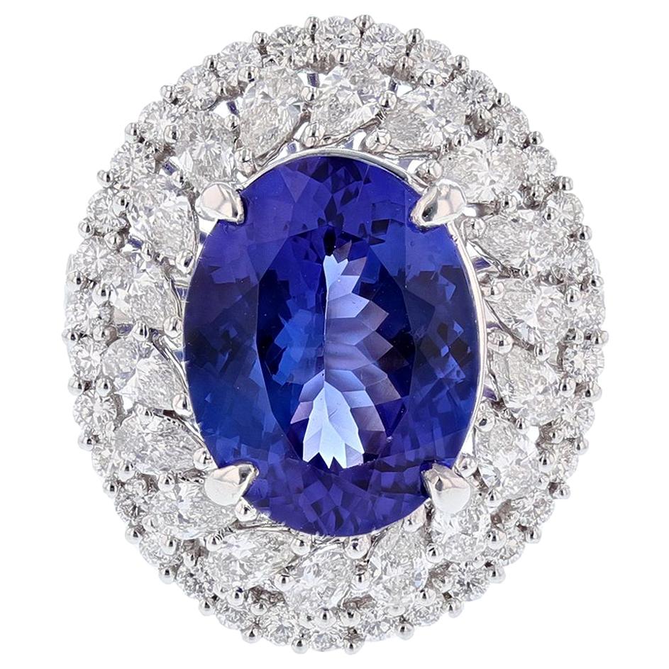 18 Karat White Gold 6.53 Carat Oval Tanzanite and Diamond Ring For Sale