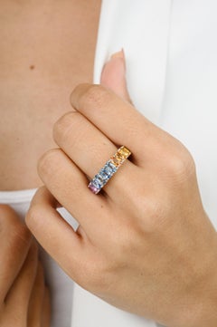 18 Karat White Gold 6.54 Carat Multi Colored Sapphire Eternity Band Ring