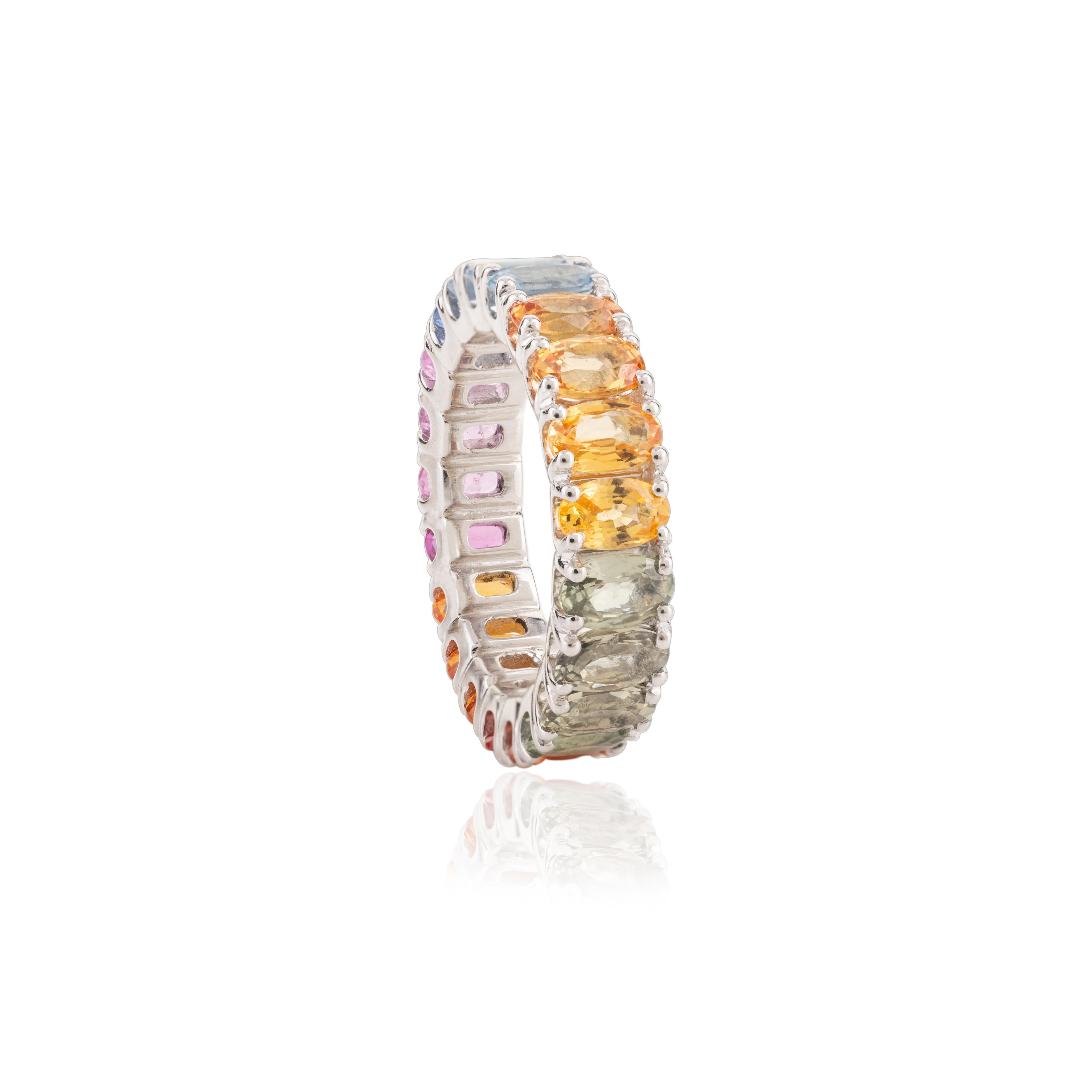 For Sale:  18 Karat White Gold 6.54 Carat Multi Colored Sapphire Eternity Band Ring 7
