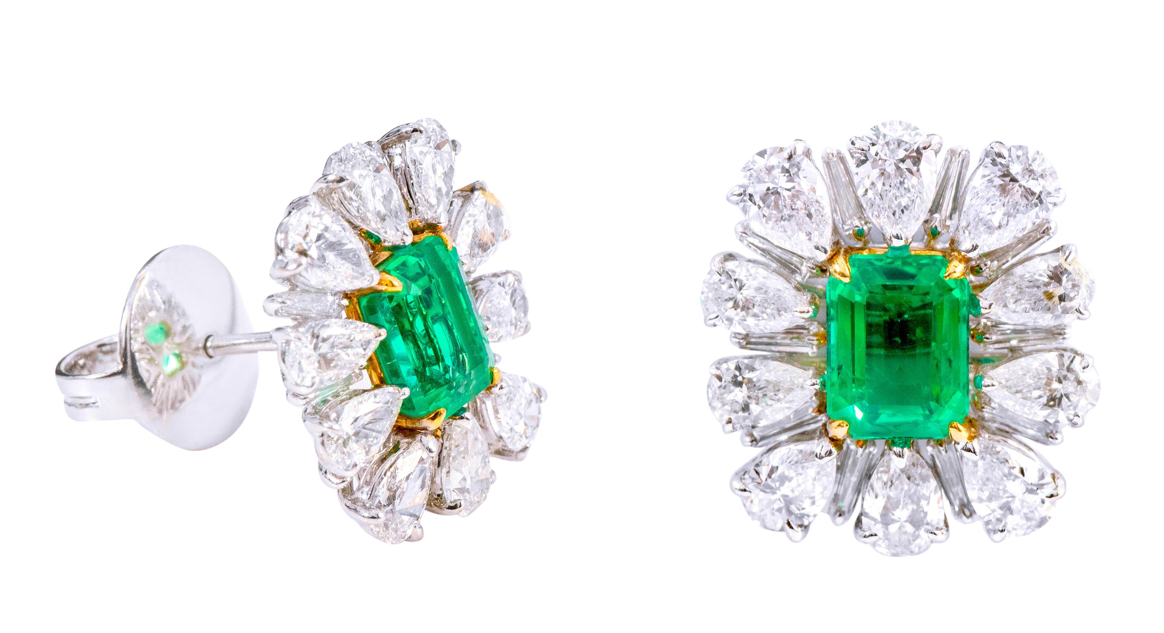 18 Karat White Gold 6.80 Carat Natural Emerald and Diamond Cluster Stud Earrings

This impressive vibrant green emerald and diamond earring is elegant. The solitaire emerald cut emerald is magnificently surrounded with a formed cluster of