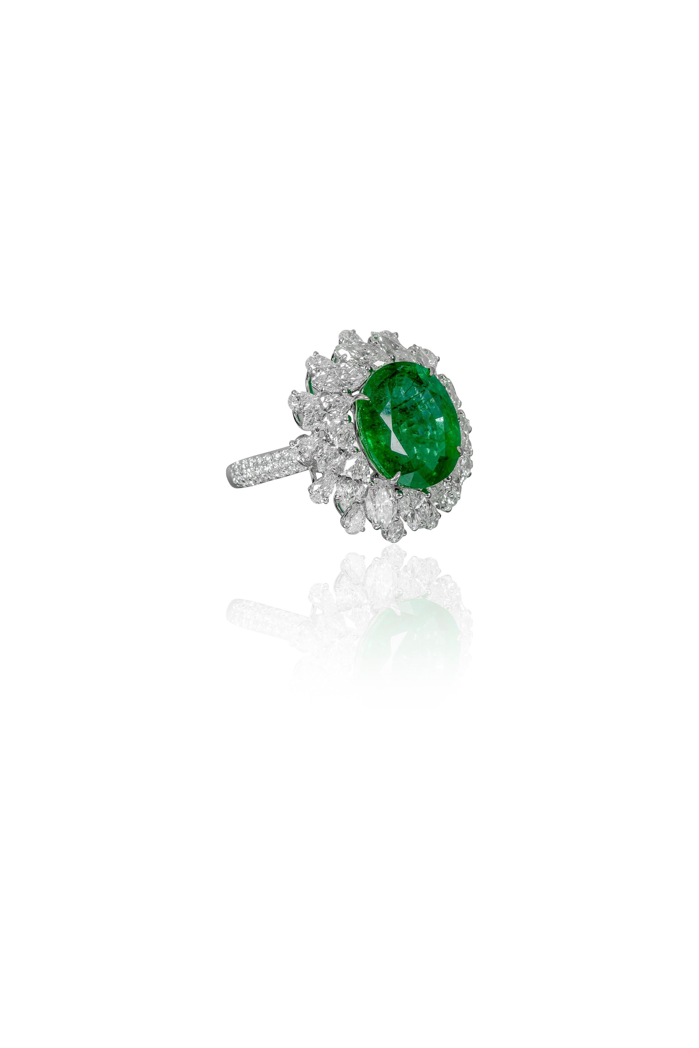 18 Karat White Gold 6.98 Carat Natural Emerald and Diamond Cluster Statement Ring

This mesmerizing rich-lush garden green emerald and diamond ring is impressive. The solitaire roundish-oval shape emerald is incredibly set in the 4-eagle prong