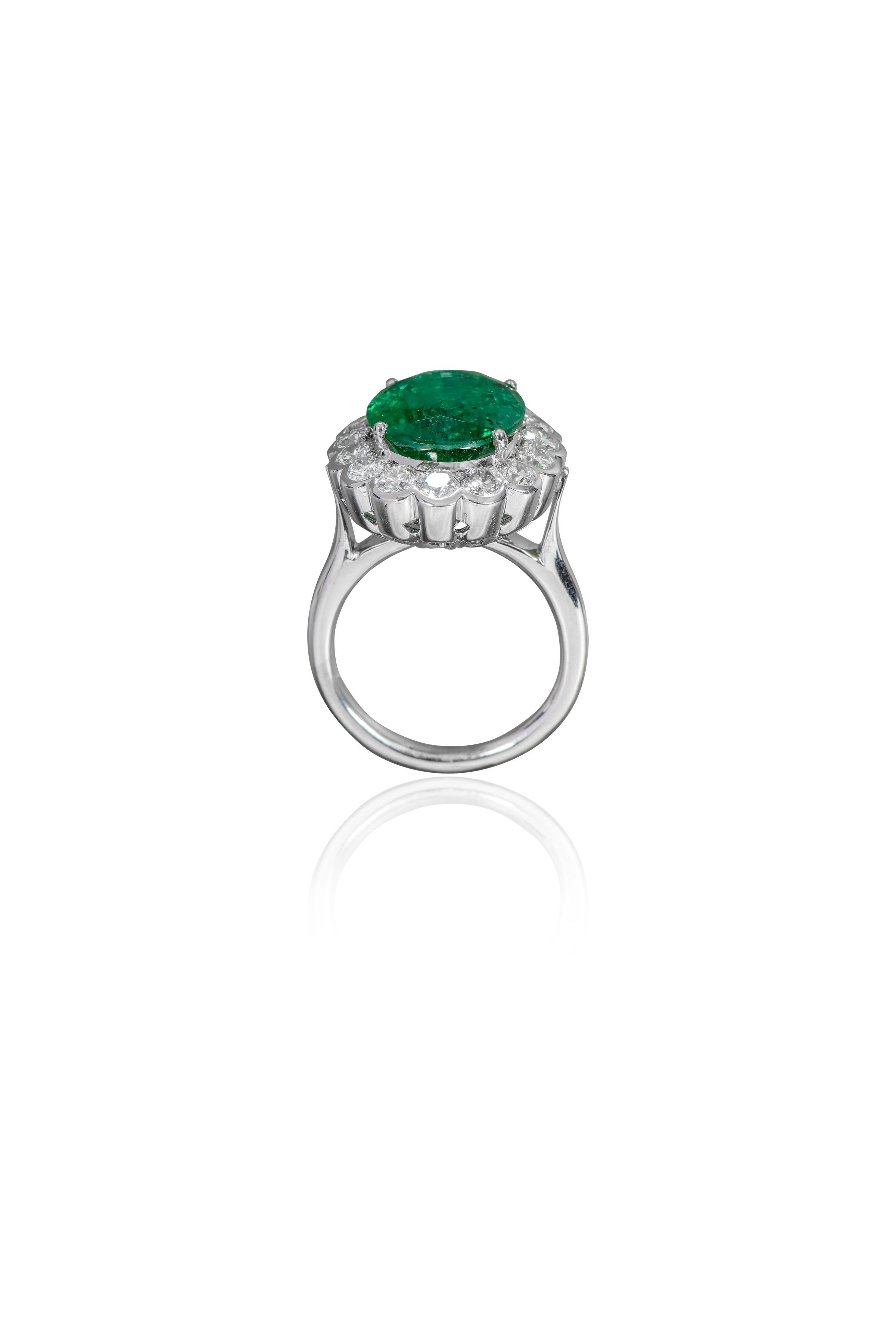 Modern 18 Karat White Gold 7.05 Carat Natural Emerald and Diamond Cluster Cocktail Ring For Sale