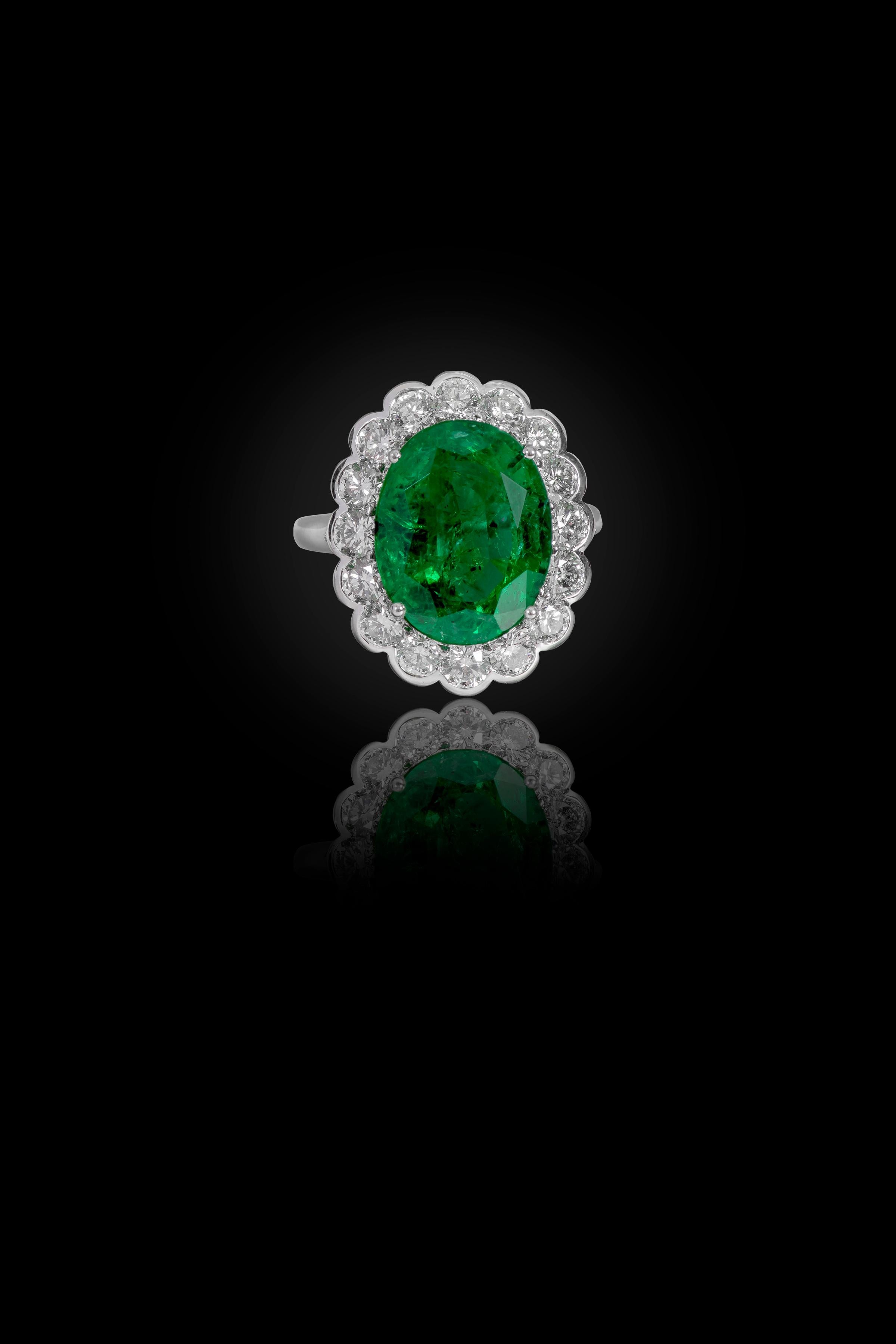 Oval Cut 18 Karat White Gold 7.05 Carat Natural Emerald and Diamond Cluster Cocktail Ring For Sale