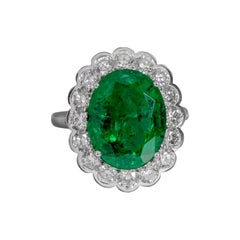 18 Karat White Gold 7.05 Carat Natural Emerald and Diamond Cluster Cocktail Ring