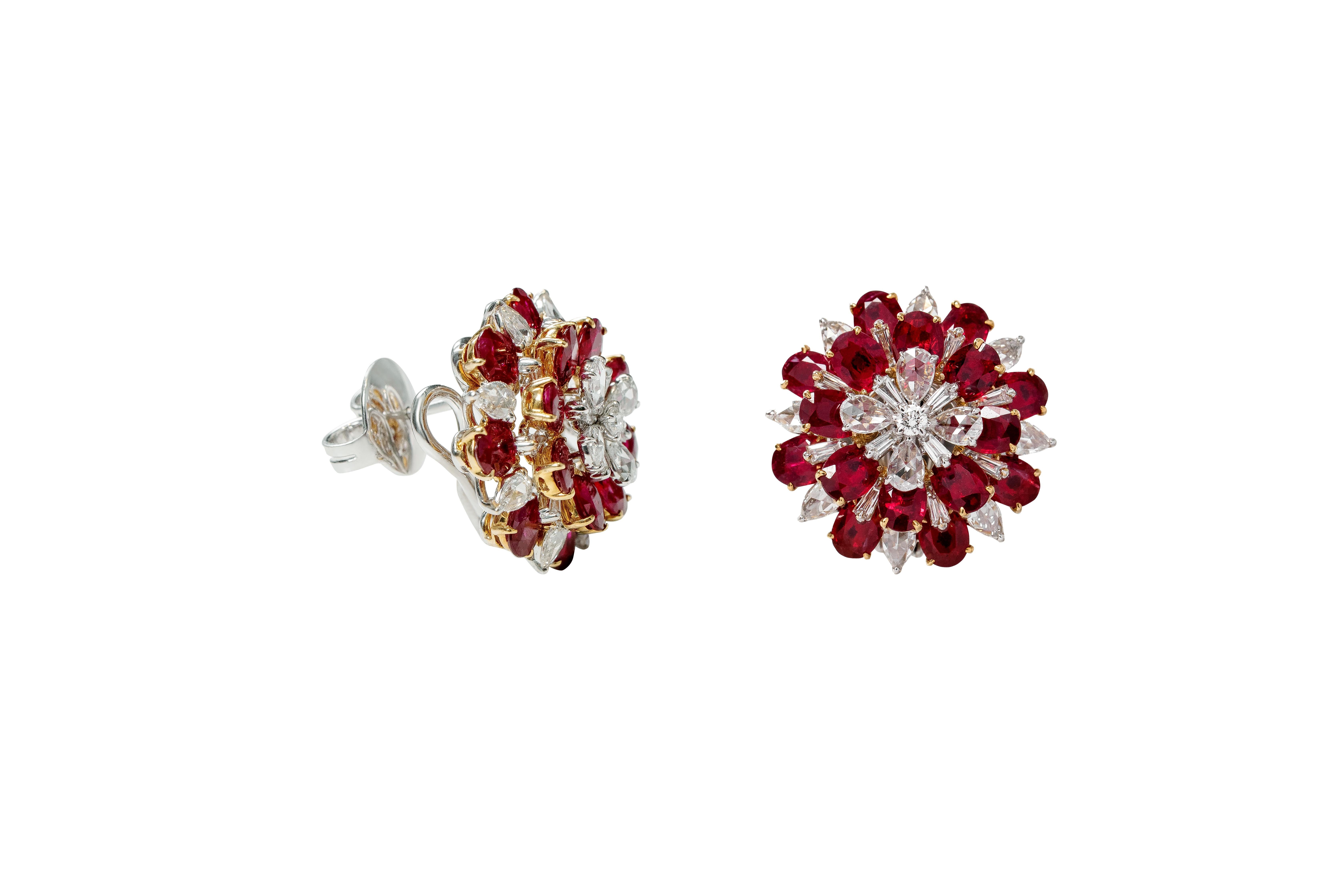 18 Karat White Gold 7.36 Carat Ruby and Diamond Flower Stud Earrings

This modulation 5-step flower petal lustrous fiery red matching ruby and fancy pear rose cut and tapered baguette full cut diamond earring makes a true statement as an immaculate