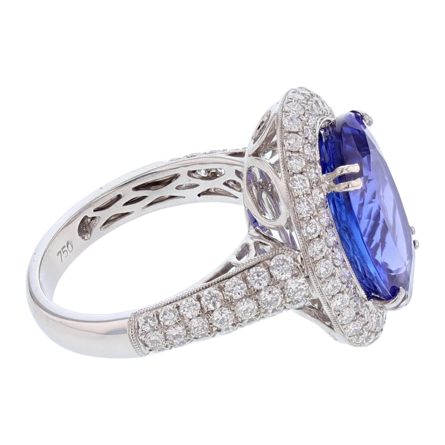 Oval Cut 18 Karat White Gold 7.62 Carat Oval Tanzanite and Diamond Ring For Sale