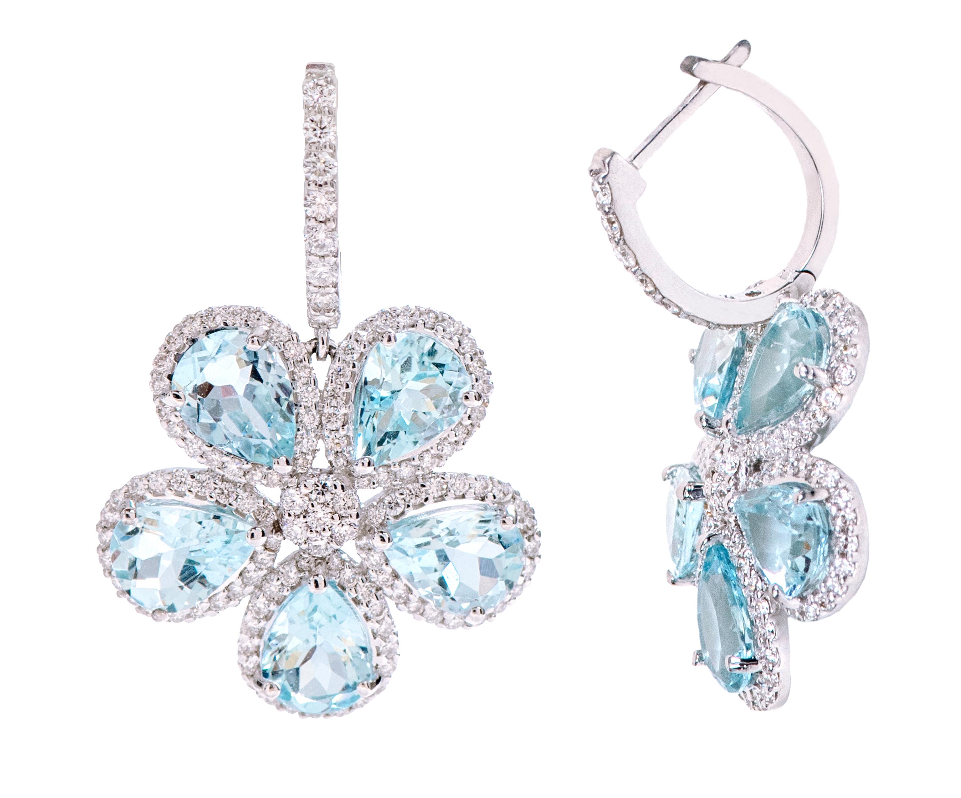18 Karat White Gold 7.86 Carat Aquamarine and Diamond Flower Statement Dangle Earrings

This sensational celeste aquamarine and diamond earring is articulate. The floral earring design shows our love for nature and its eminent beauty. The short and