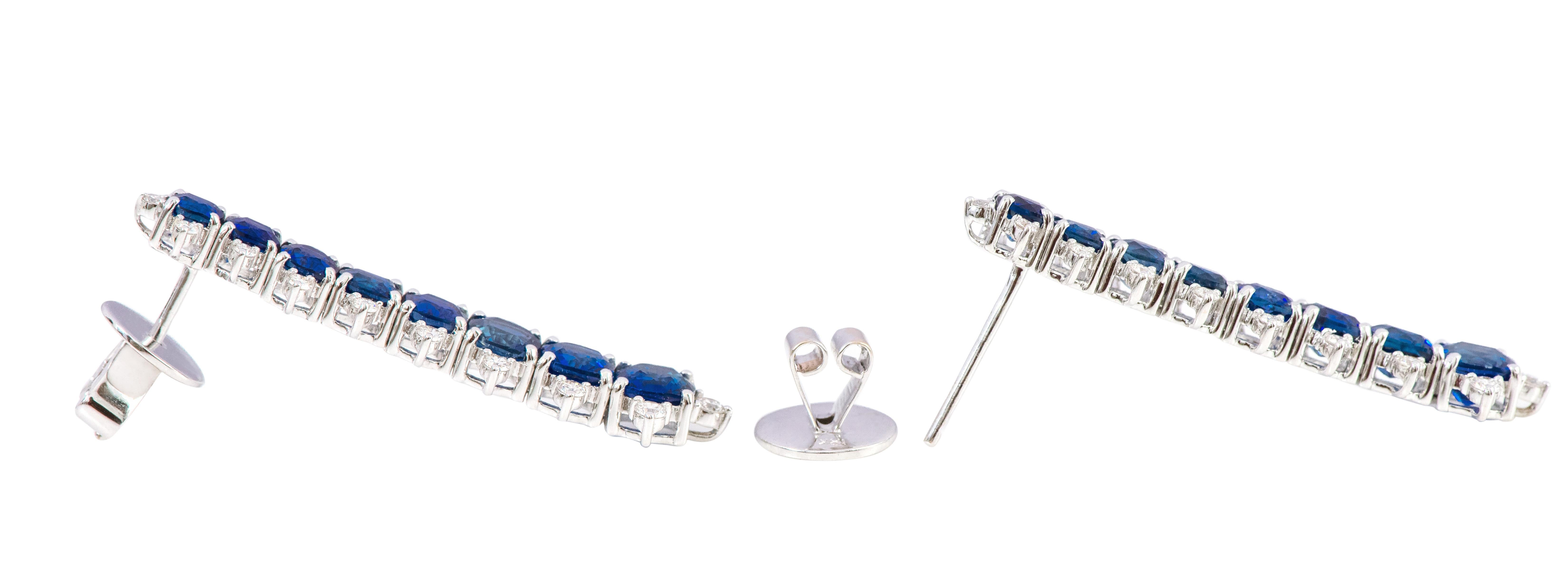 18 Karat White Gold 7.90 Carat Sapphire and Diamond Dangle Earrings

This marvelous vivid blue sapphire and diamond long earring is mesmerizing. The perfect graduating cushion cut sapphires form the long look of the earring with round diamonds on