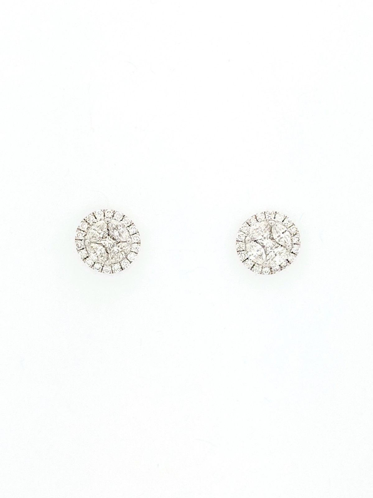 You are viewing a beautiful pair of illusion set diamond halo stud earrings. These earrings are crafted from 18k white gold and weighs .9 grams. They feature (1) .10ct natural princess cut diamond in the center of (4) .03ct natural marquise