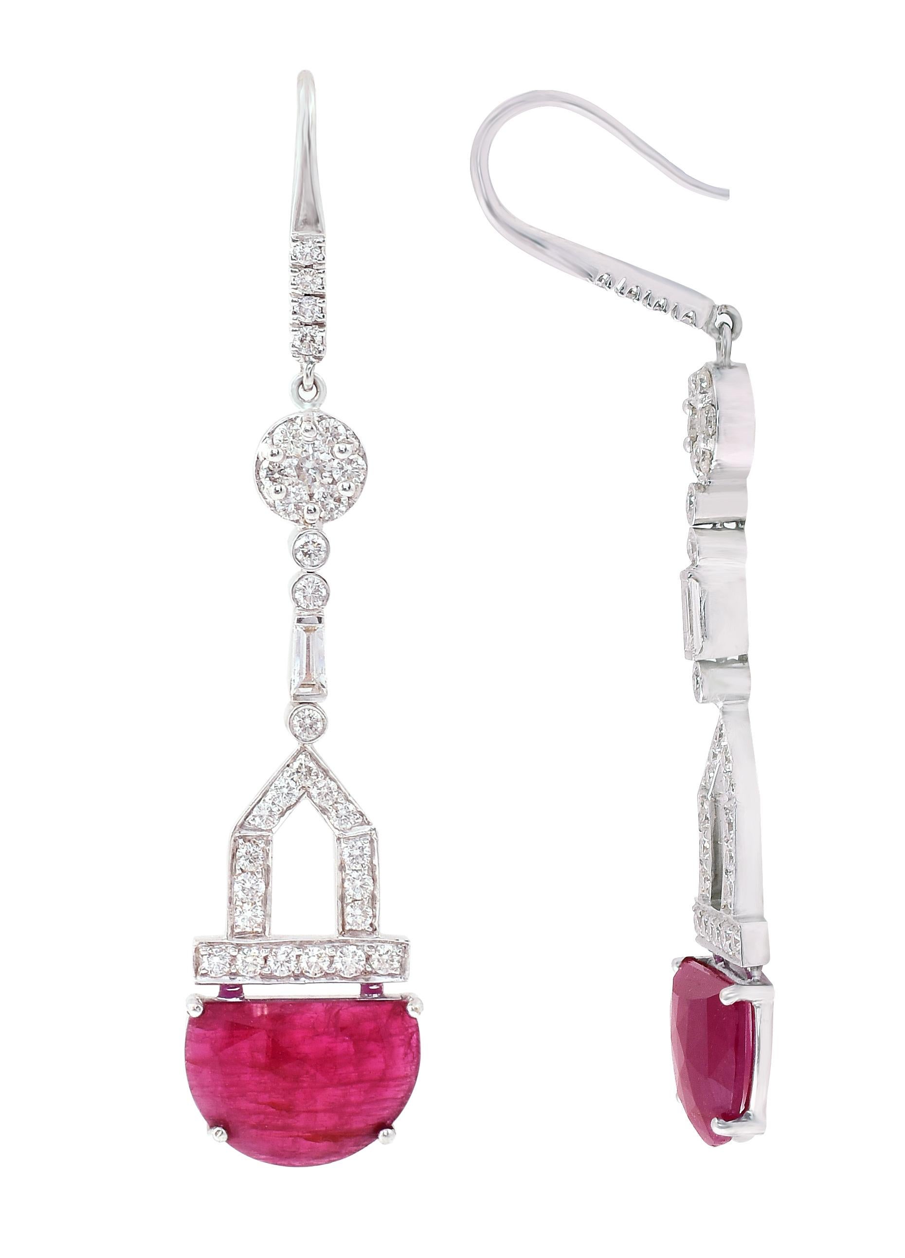 18 Karat White Gold 8.72 Carat Ruby and Diamond Unique-Cut Drop Earrings

This glorious crimson red ruby and diamond long slice hanging earring is exquisite. The solitaire fancy d-shaped faceted slice ruby gives depth and dramatic feel to the