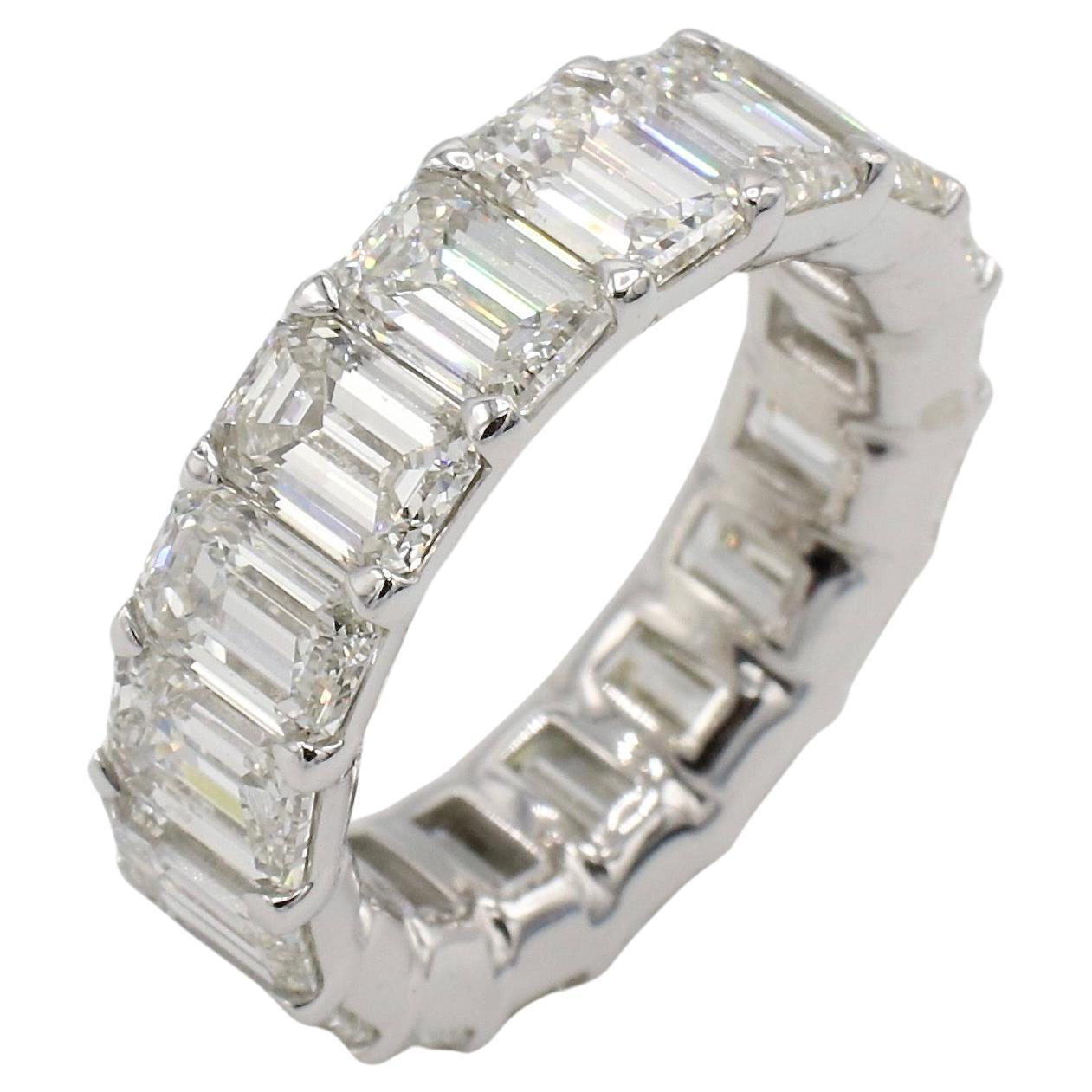18 Karat White Gold 8.75 Carat Emerald Cut Natural Diamond Eternity Band Ring 
Metal: 18 Karat White Gold
Weight: 6.2 grams
Diamonds: Approx. 8.75 CTW H-I VS emerald cut natural diamonds 
Size: 5.25 (US)
Width: 6mm
