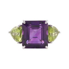 18 Karat White Gold 8.79 Carat Amethyst and Peridot Three-Stone Ring