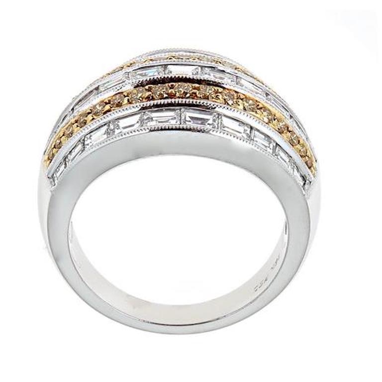 18 Karat White Gold and 2.35 Carat Diamond Cocktail Ring Fashion Jewelry

Perfect for a date or any occasion, this ring is just a creation of art.  Crafted in 18k White Gold, features two rows of fancy yellow round diamonds, alternating with three