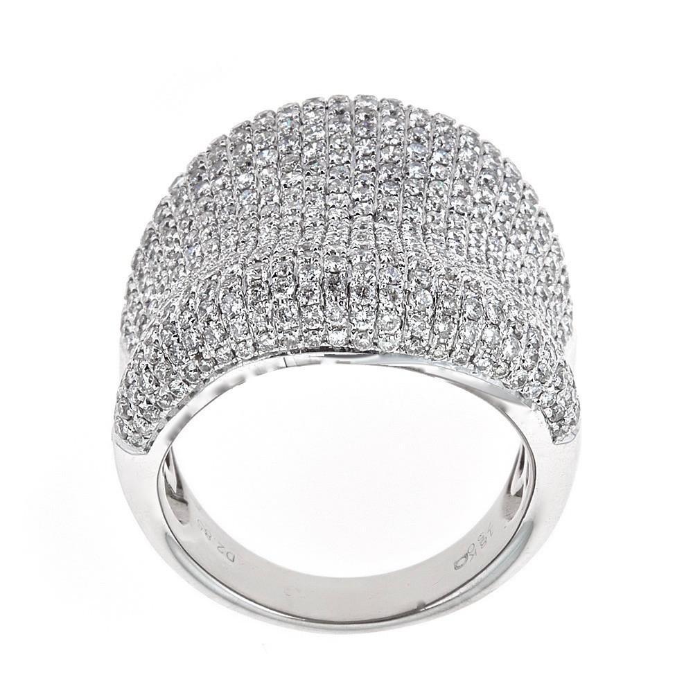 18 Karat White Gold and 2.85 Carat Diamond Pave Cluster Fashion Ring Size 7

Uniquely designed this ring will bring so much sparkle to your look. 2.85 TCW of glistening round diamonds a set on top of the ring in pavè setting, fashioned in 18k White