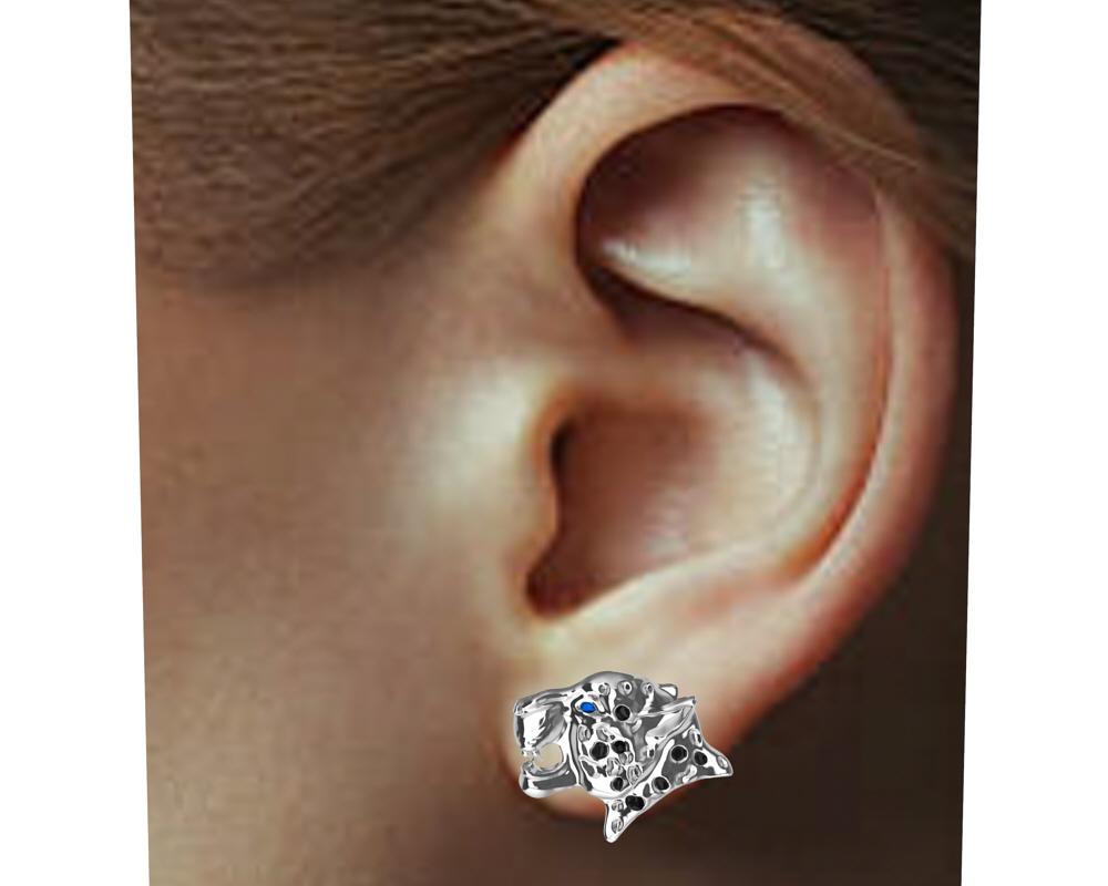 18 Karat White Gold and Black Diamonds  Sapphire eyes  Leopard Stud Earrings, Tiffany designer Thomas Kurilla went back to the archives in the collection of metal stampings  The leopard, one of the fastest land animals. Beautiful spots ,elegant in
