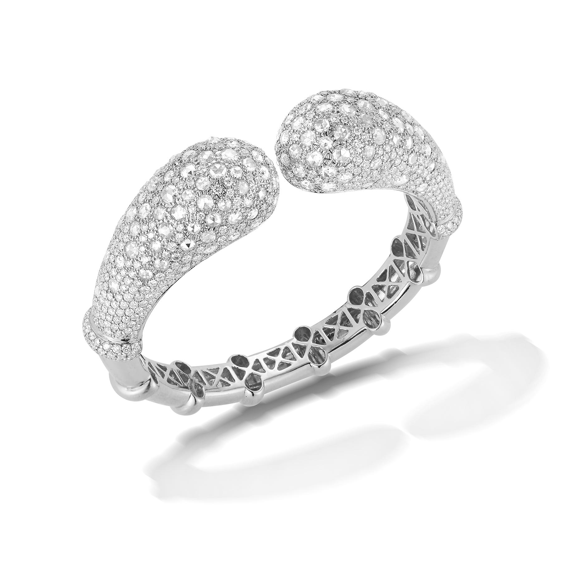 Beautiful 18K White Gold Bangle Bracelet in a wraparound Cuff-Style containing F-VS White Round Diamonds totaling 19.30 Carats.
