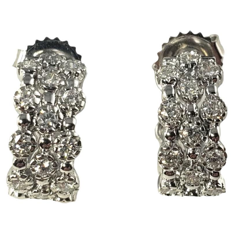 18 Karat White Gold and Diamond Cuff Earrings For Sale