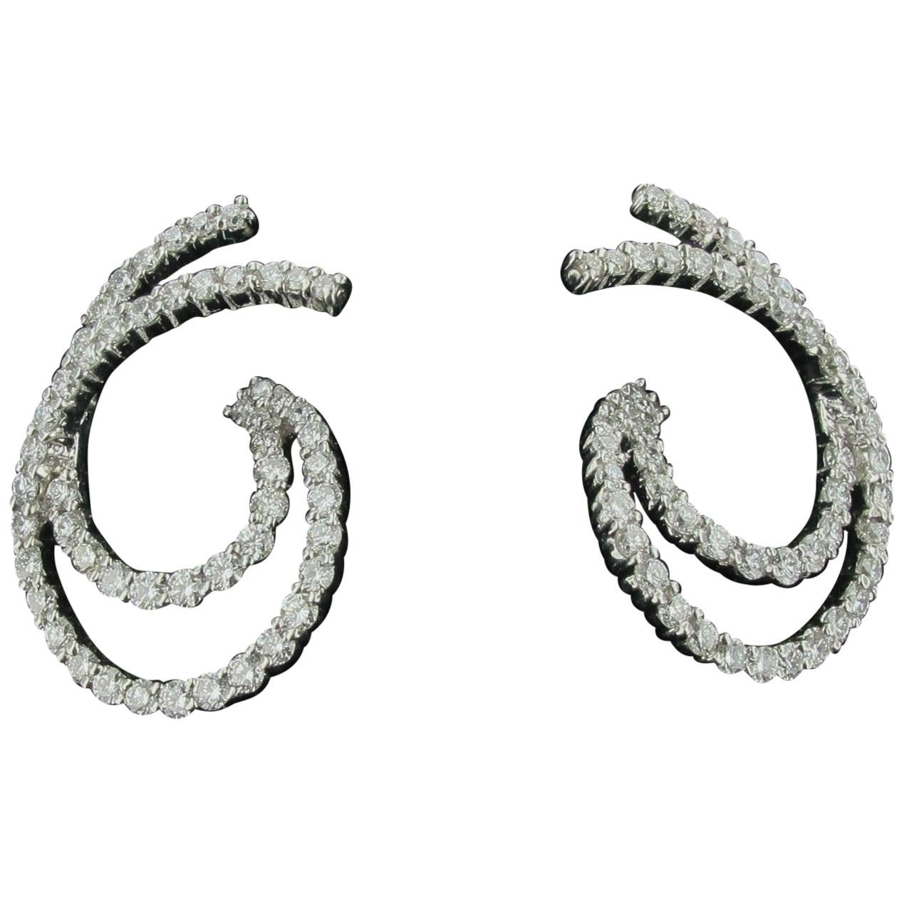 18 Karat White Gold and Diamond Earrings in Double Swirl