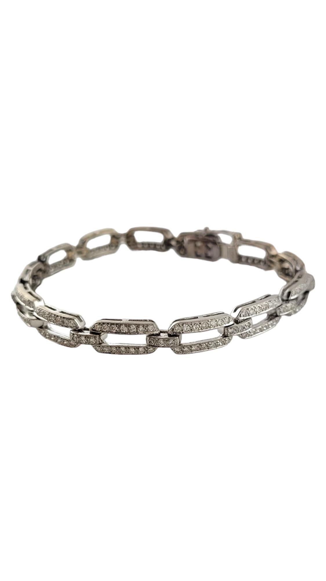 This sparkling bracelet features 221 round brilliant cut diamonds set in classic 18K white gold.

Width: 5 mm.

Approximate total diamond weight: 1.10 ct.

Diamond color: I-J

Diamond clarity: SI1-VS2

Size: Fits up to 6.25 inches - small in
