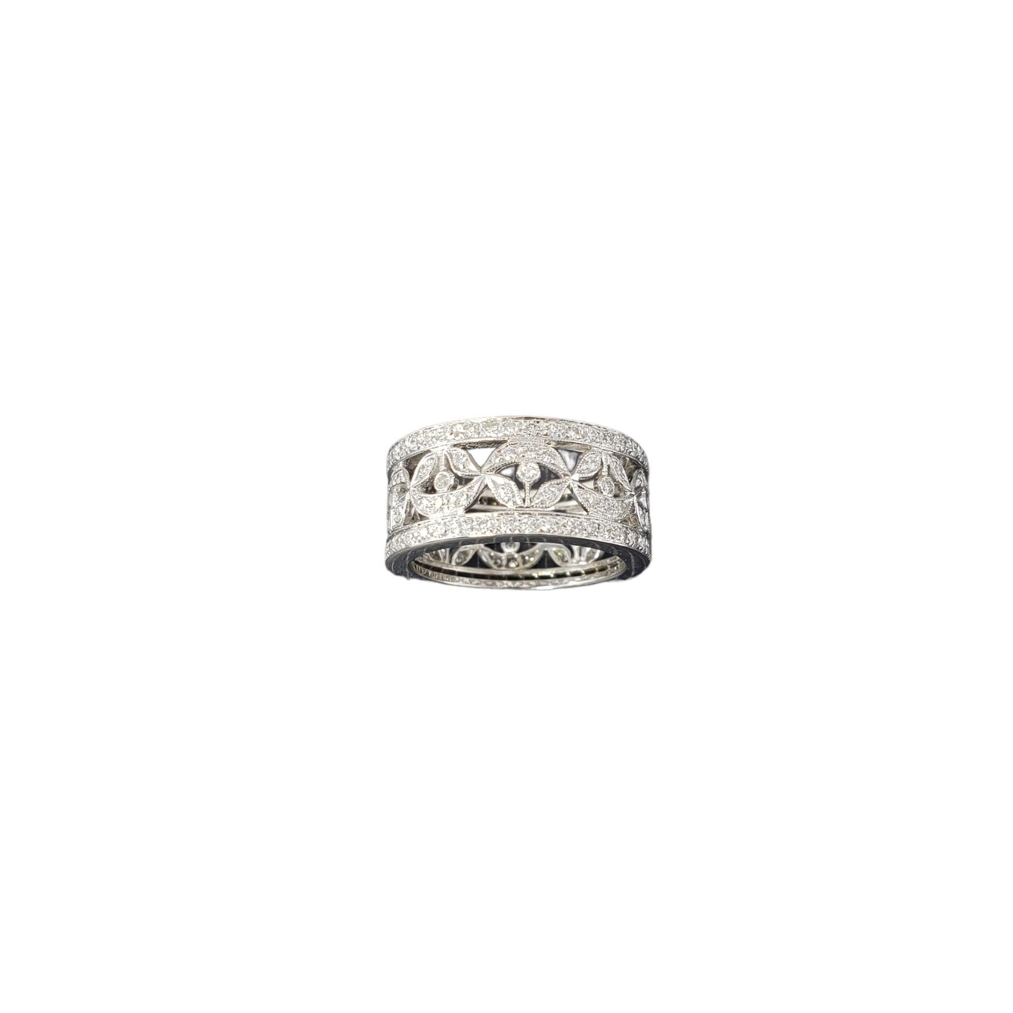 18 Karat White Gold and Diamond Open Band Ring Size 5.75

This sparkling band features 144 round brilliant cut diamonds set in classic 18K white gold.  

Width: 9 mm.

Approximate total diamond weight: .96 ct.

Diamond color: H-I

Diamond clarity: