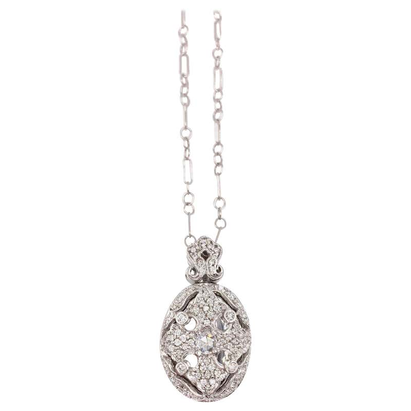 18 Karat White Gold And Diamond Oval Locket Necklace At 1stDibs 18-karat-white-gold-and-diamond-oval-locket-necklace-at-1stdibs