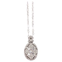 18 Karat White Gold and Diamond Oval Locket Necklace