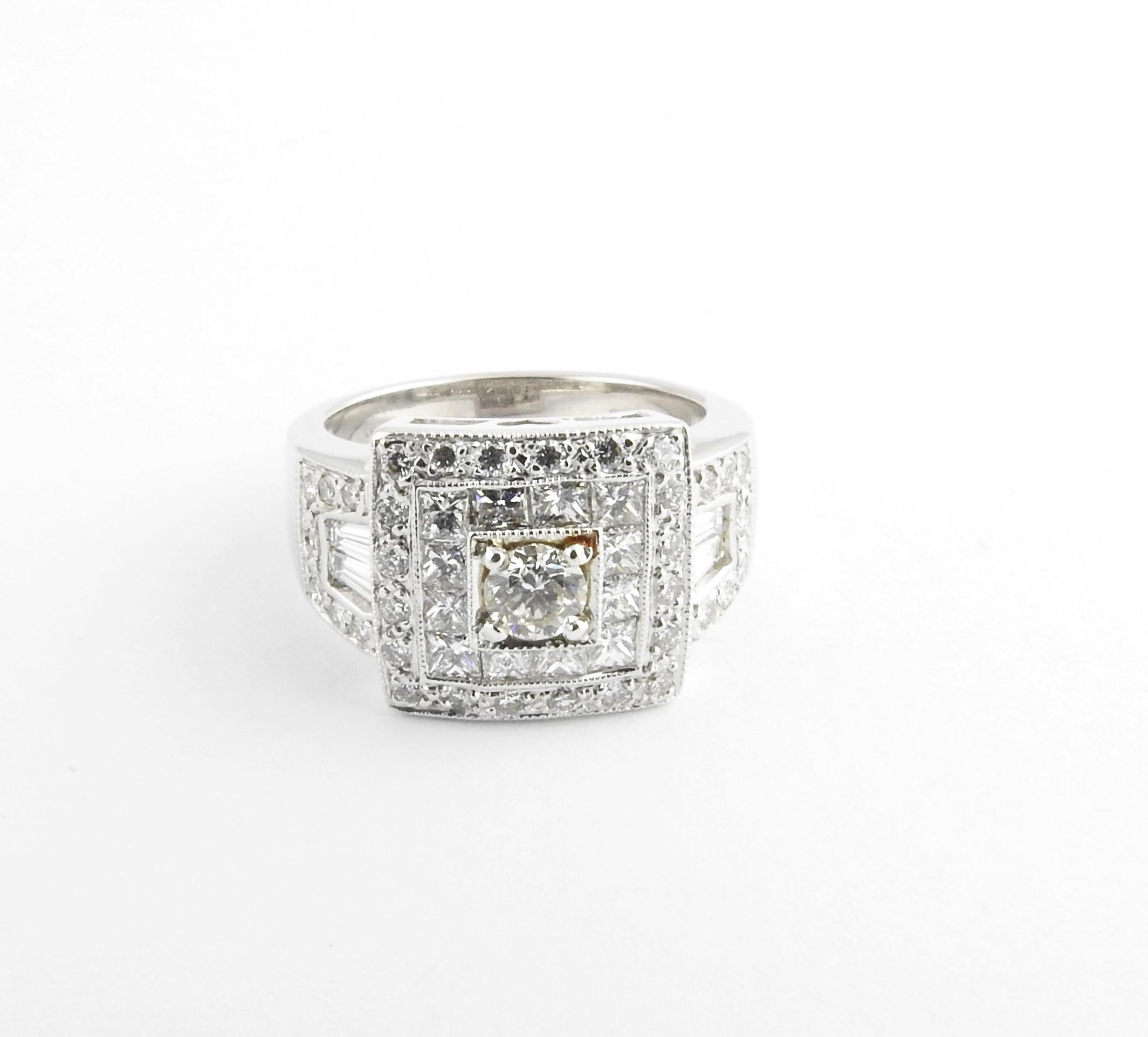 Vintage 18 Karat White Gold and Diamond Ring Size 6

This sparkling ring features 28 round brilliant cut diamonds, 12 princess cut daimonds and two baguette diamonds set in beautifully detailed 18K white gold. Width: 12 mm. Shank: 4 mm.

Approximate