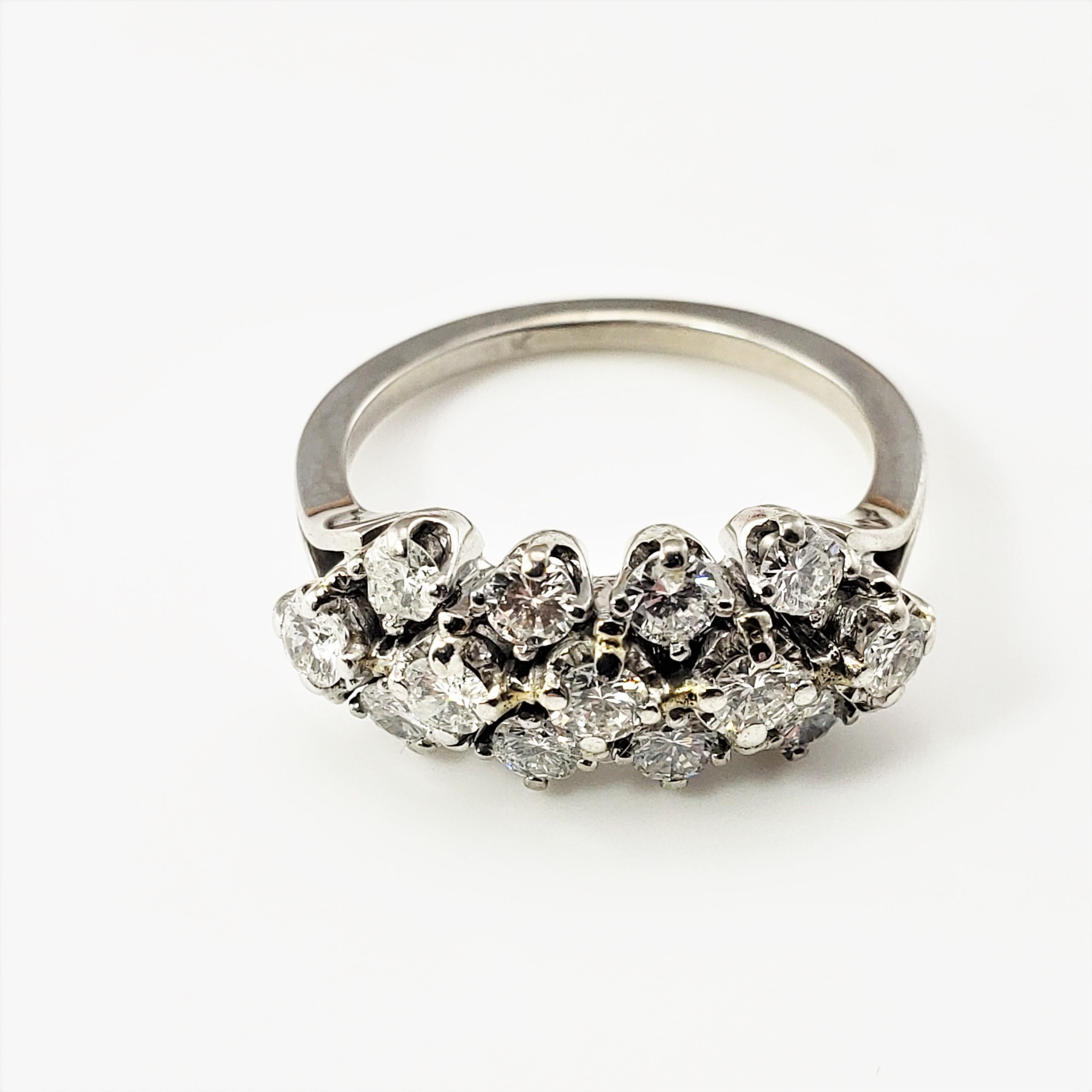 18 Karat White Gold and Diamond Ring Size 5.75-

This dazzling ring features 13 round brilliant cut diamonds* set in elegant 18K white gold.  Width:  7 mm.  Shank:  1.5 mm.
*Three stones have chips not visible to naked eye.

Approximate total