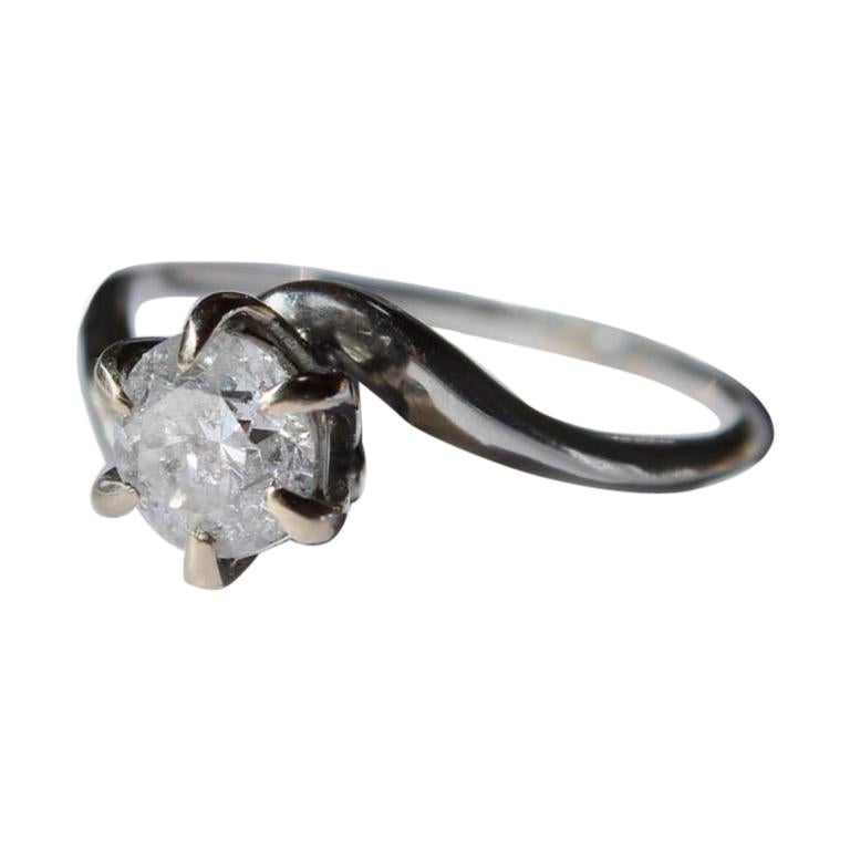 18 Karat White Gold and Diamond Swirl Ring For Sale