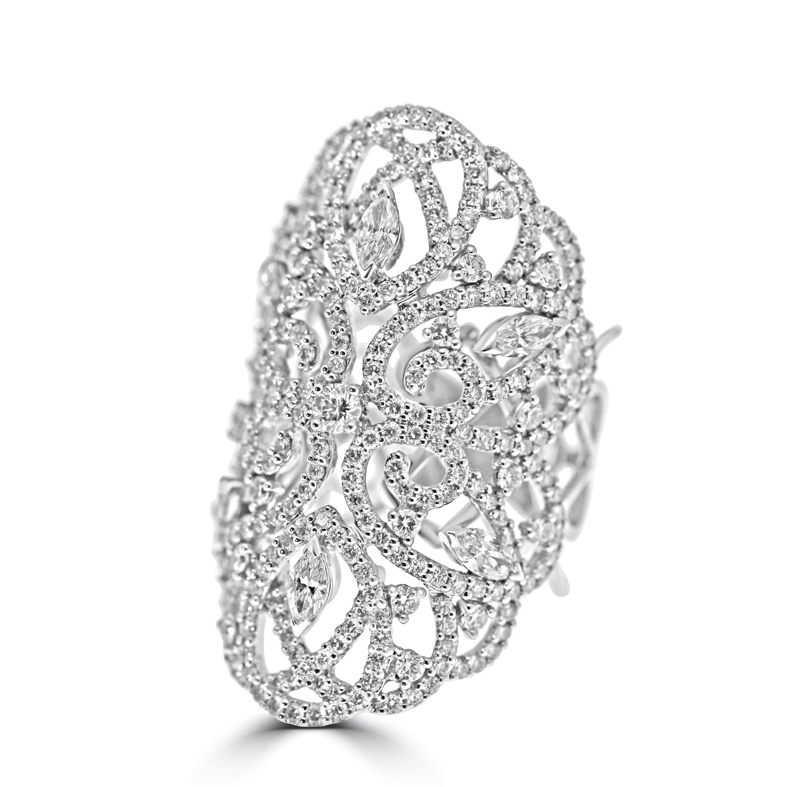 Exquisite 18kt white gold lace ring.
Set with 3.50ct of pure white brilliant and marquise cut diamonds to add an extra fancy touch.
Very comfortable to wear,  as the back is specially crafted to not be thick and heavy.




