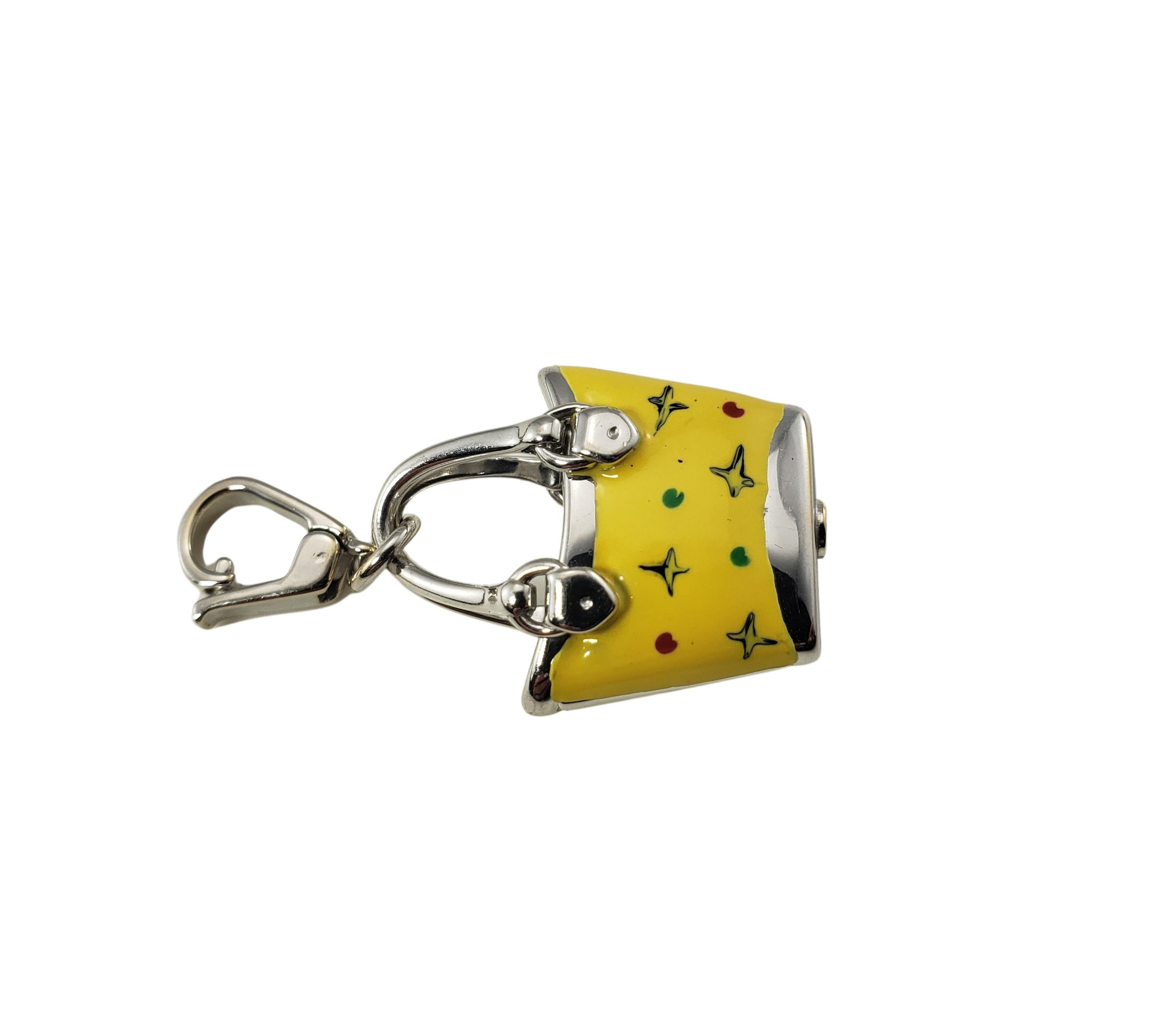 Vintage 18 Karat White Gold and Enamel Handbag Charm-

For the fashionista in your life!

This lovely 3D charm features a miniature handbag crafted in 18K white gold and decorated with colorful yellow enamel.

Size: 23 mm x 18 mm

Weight:  2.8 dwt.