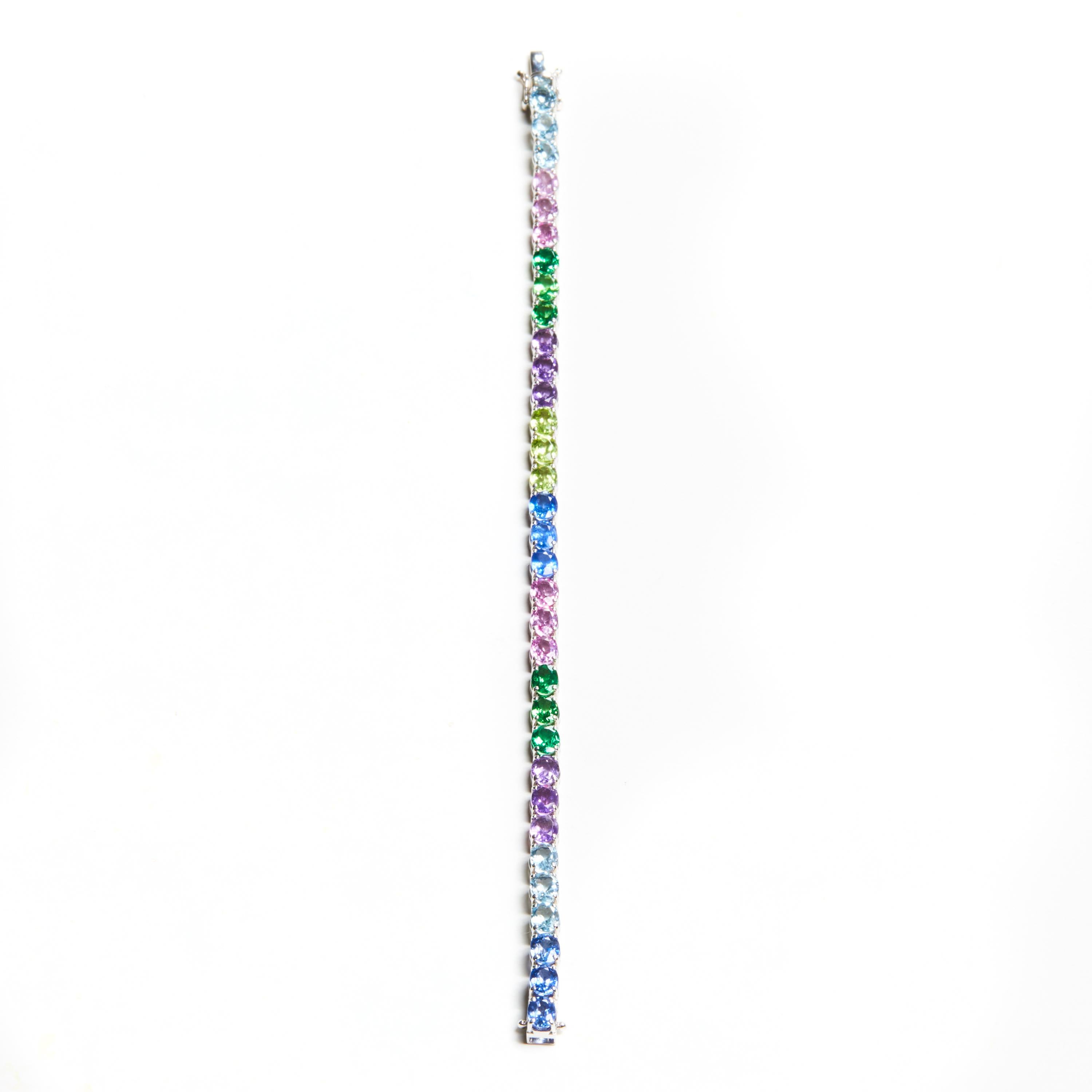 18 Karat White Gold and multi color stones Bracelet

6 Aquamarine 1.91 ct.
6 Saphire 3.31 ct.
6 Pink Saphire 2.37 ct
6 Peridot 2,46 ct.
6 Amethyst 1.84 ct.
6 Tsavorite 2.11 ct.



Founded in 1974, Gianni Lazzaro is a family-owned jewelry company