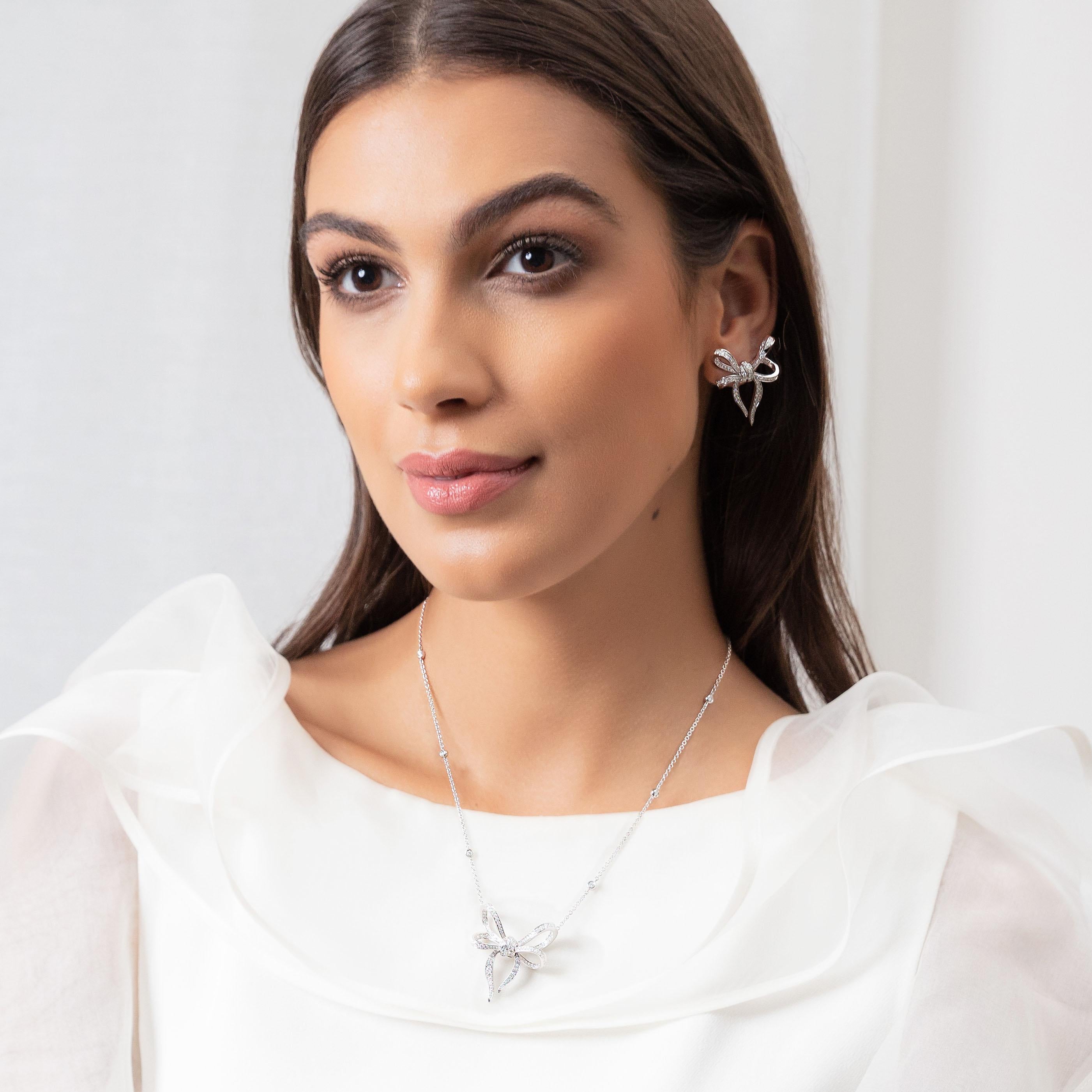 Women's 18 Karat White Gold and White Diamonds Bow Pendant For Sale
