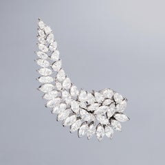 Orecchino singolo in oro bianco 18 carati e diamanti bianchi