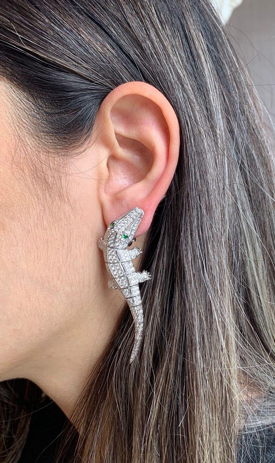 18 Karat white gold 'Another World' limited edition Crocodile earring created by Monan with 4.98 carats of round brilliant cut diamonds and 0.18 carats of emeralds. 
 ‘Another World’ is a magical Monan Dreamworld, inhabited by extinct animals who