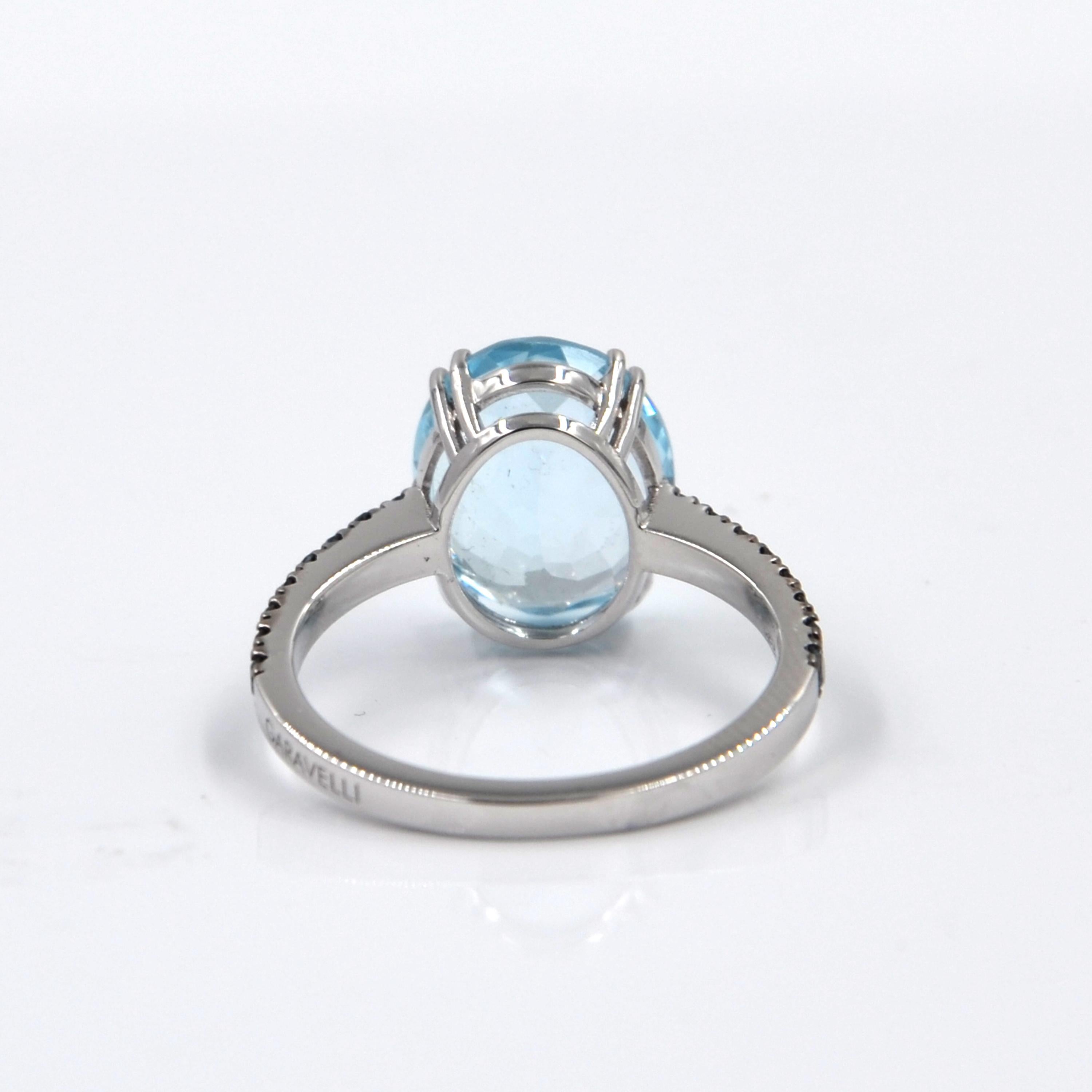 Round Cut 18 Karat White Gold Aquamarine and Blue Diamonds Garavelli Ring