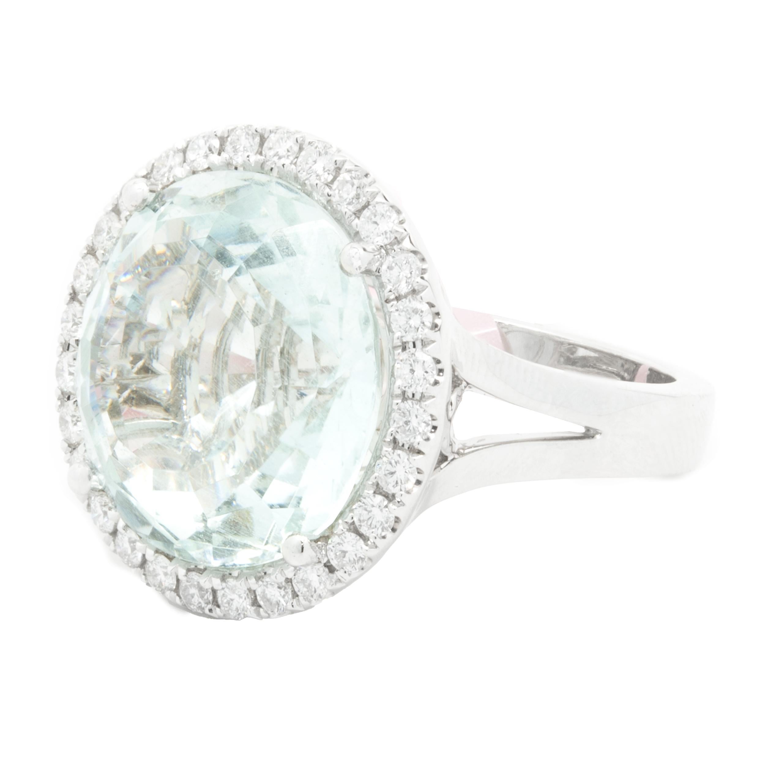 Designer: custom
Material: 18K white gold
Diamond: 28 round brilliant cut = 0.62cttw
Color: G
Clarity: VS1-2
Aquamarine: 1 round cut = 14.22ct
Ring Size: 6 (complimentary sizing available)
Weight: 13.30 grams