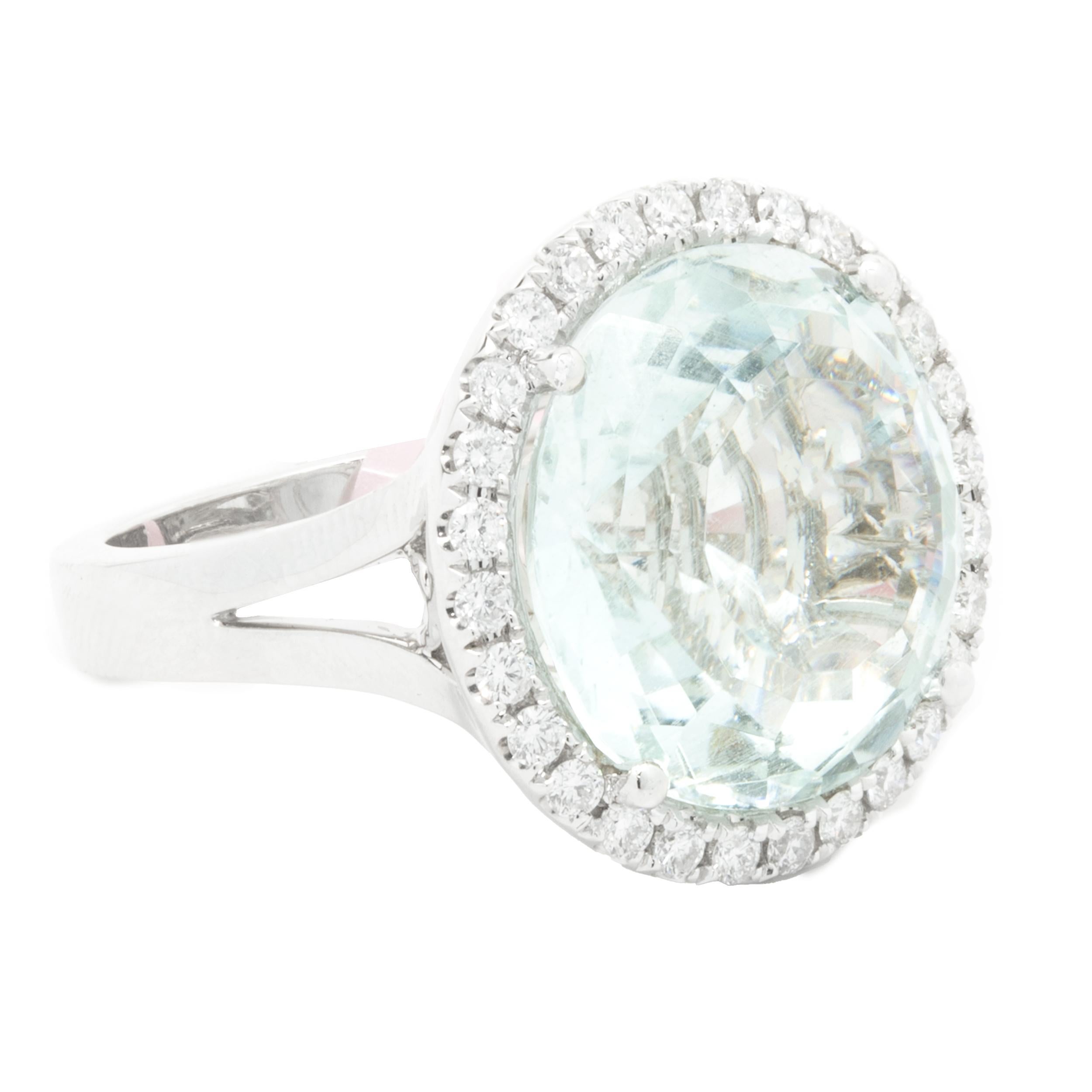 Round Cut 18 Karat White Gold Aquamarine and Diamond Halo Ring For Sale