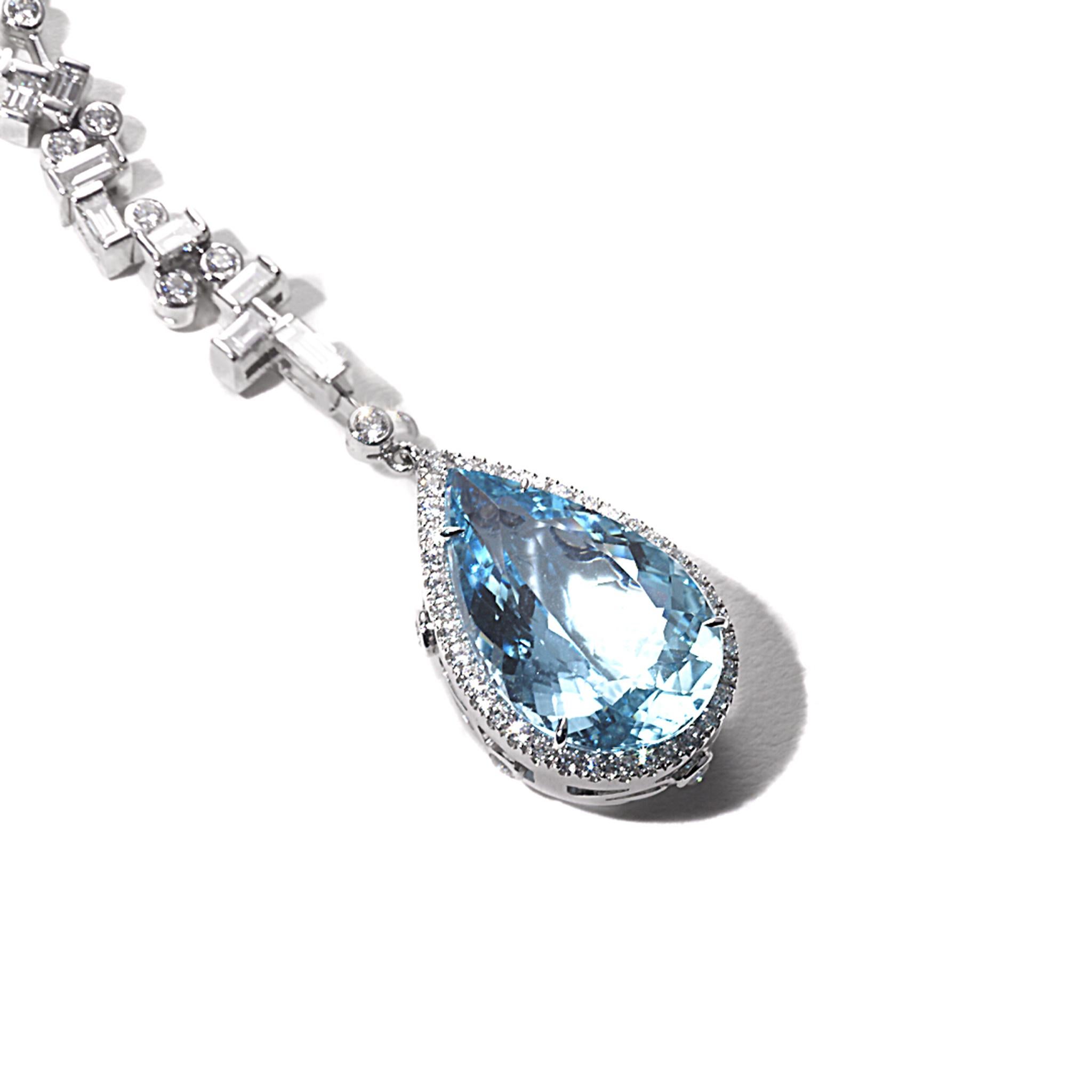 Trinity collection Y drop necklace set in 18K white gold with 7.91cts aquamarine and 4.20cts diamond. Length measures 18 inches.

