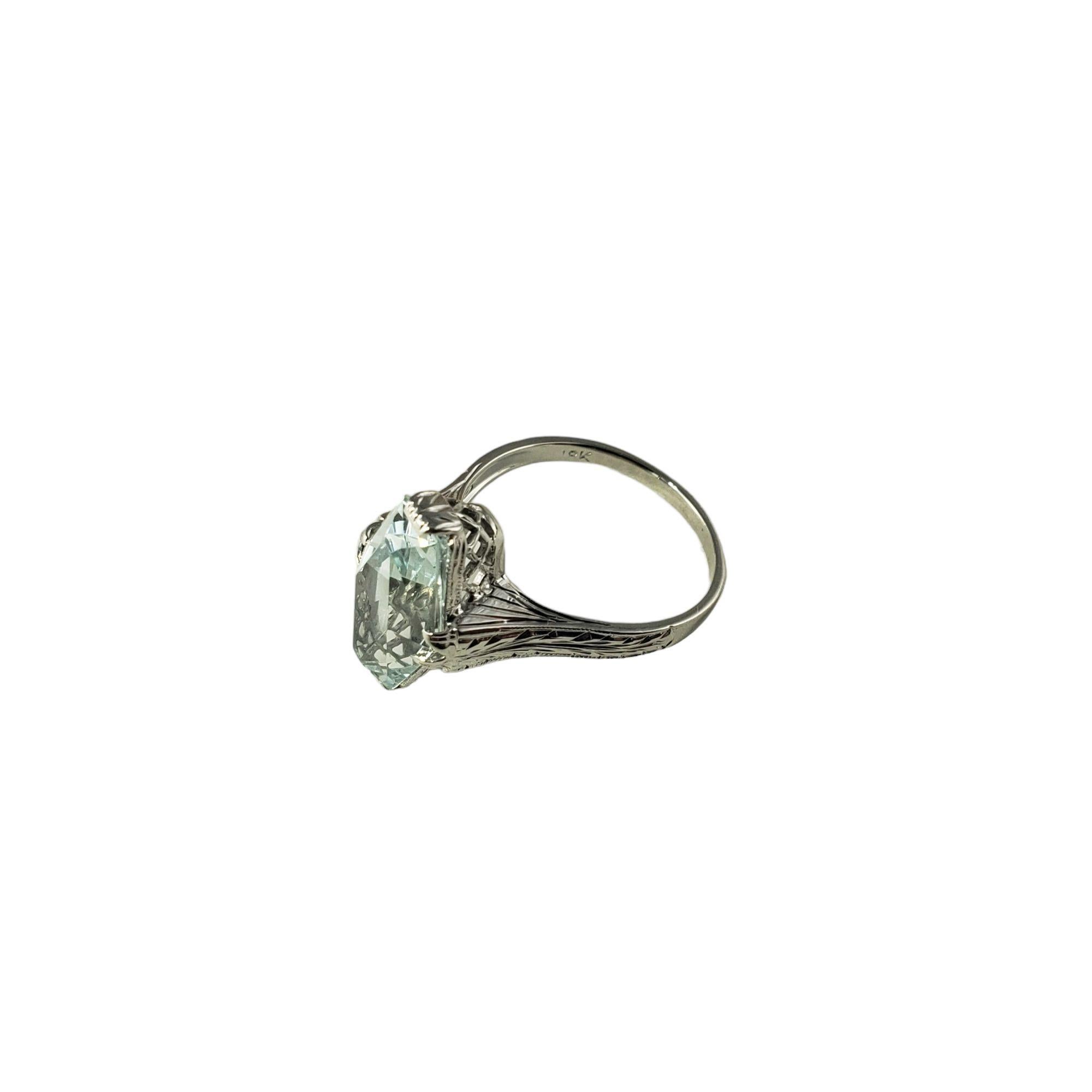 Vintage 18 Karat White Gold Aquamarine Ring Size 5.5 JAGi Certified-

This stunning ring features one hexagon shaped aquamarine set in beautifully detailed 18K white gold. Top of ring measures
15 mm x 10 mm. Shank: 2 mm.

Aquamarine weight: 3.95